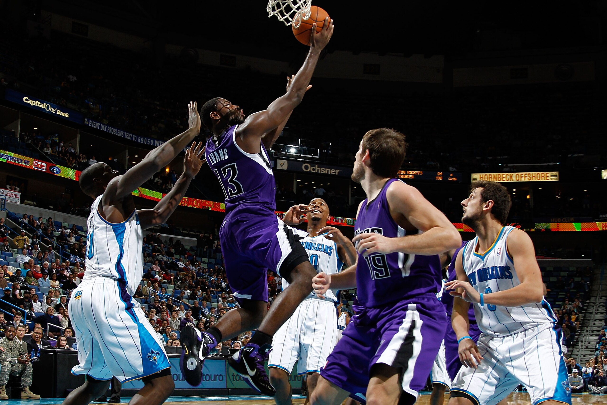 NEW ORLEANS, LA - DECEMBER 15:  Tyreke Evans #13 of the Sacramento Kings shoots the ball over Emeka Okafor #50 of the New Orleans Hornets  at the New Orleans Arena on December 15, 2010 in New Orleans, Louisiana.  The Hornets defeated the Kings 94-91.  NOT