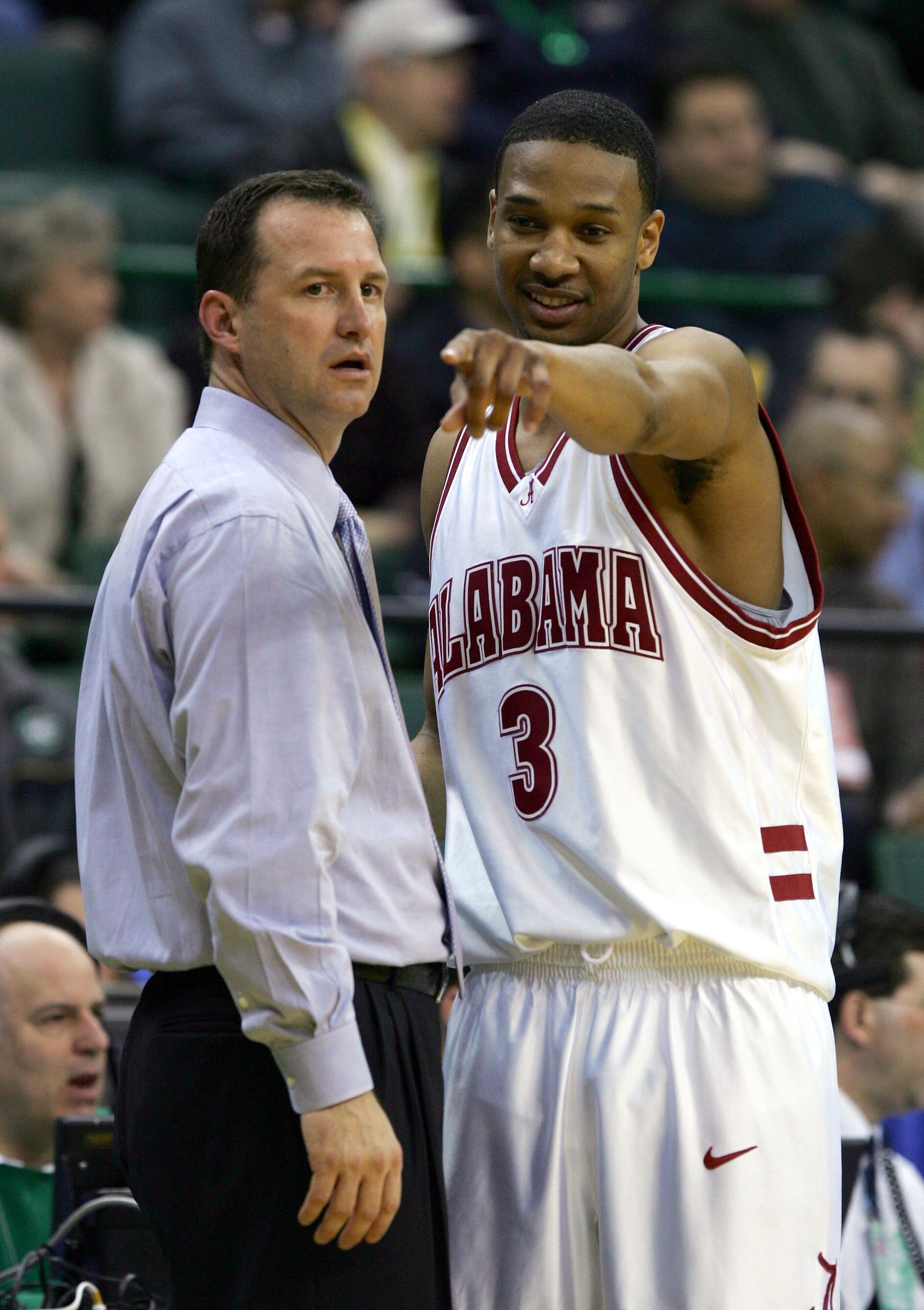 CLEVELAND,OH - MARCH 17:  Kennedy Winston, # 3, of the Alabama Crimson Tide talks with coach Mark Gottfried during thier game against the Milwaukee-Wisconsin Panthers during the first round of the 2005 NCAA Championship on March 17, 2005 at The Wolstein C