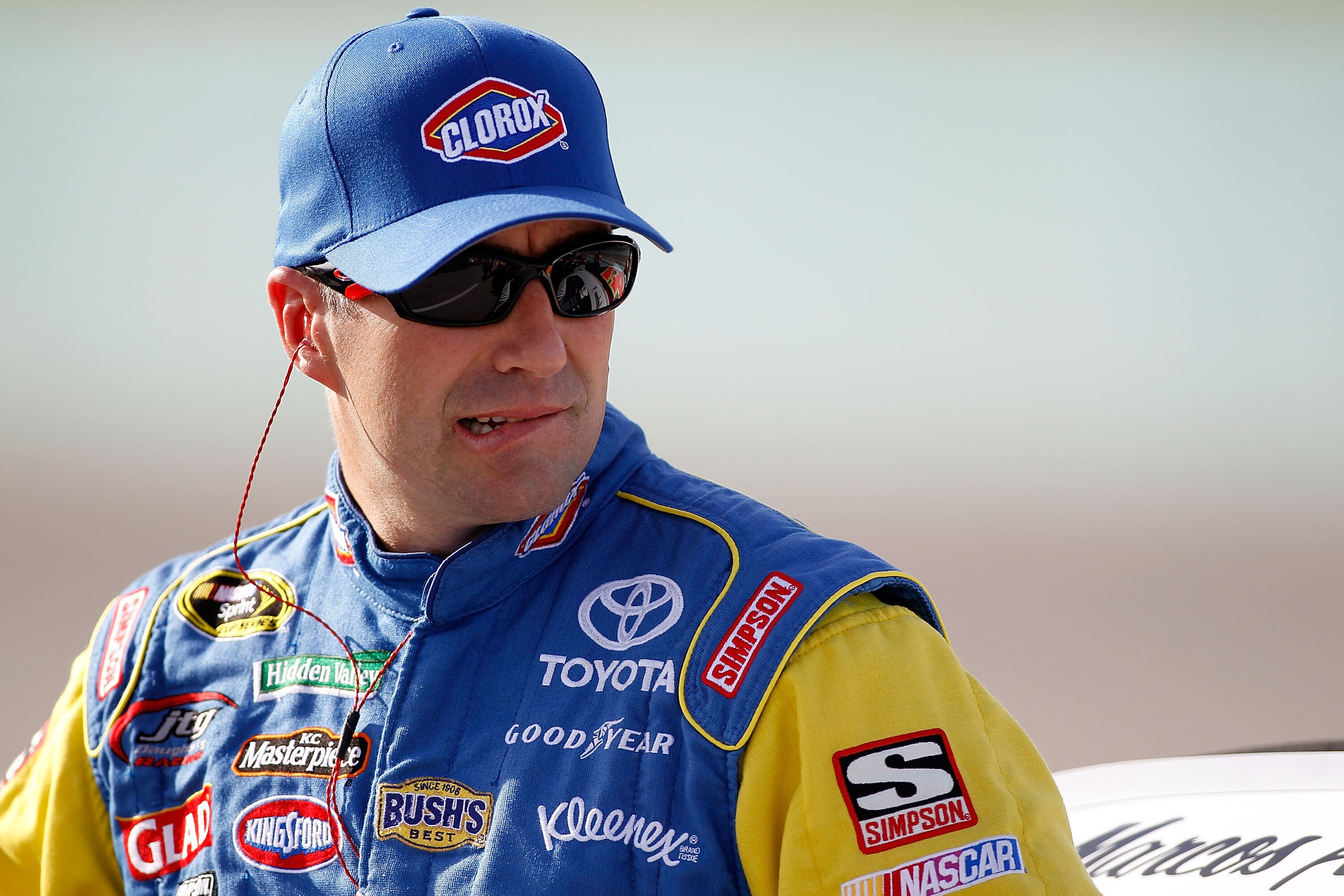 HOMESTEAD, FL - NOVEMBER 19:  Marcos Ambrose, driver of the #47 Clorox Toyota, stands on the grid during qualifying for the NASCAR Sprint Cup Series Ford 400 at Homestead-Miami Speedway on November 19, 2010 in Homestead, Florida.  (Photo by Todd Warshaw/G