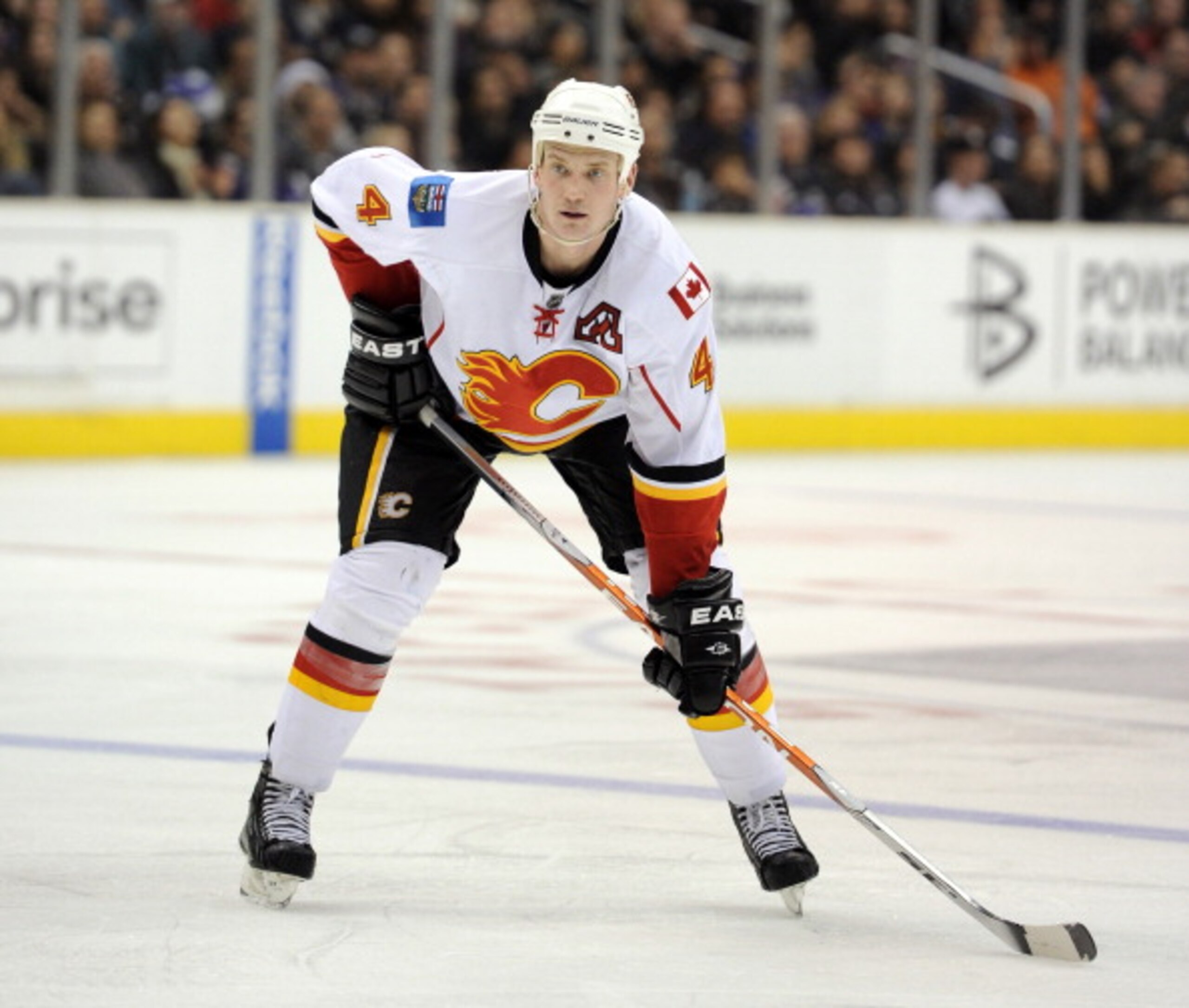 LOS ANGELES, CA - DECEMBER 09:  Jay Bouwmeester #4 of the Calgary Flames waits for a sacfeoff against the Los Angeles Kings during the game at the Staples Center on December 9, 2010 in Los Angeles, California.  (Photo by Harry How/Getty Images)