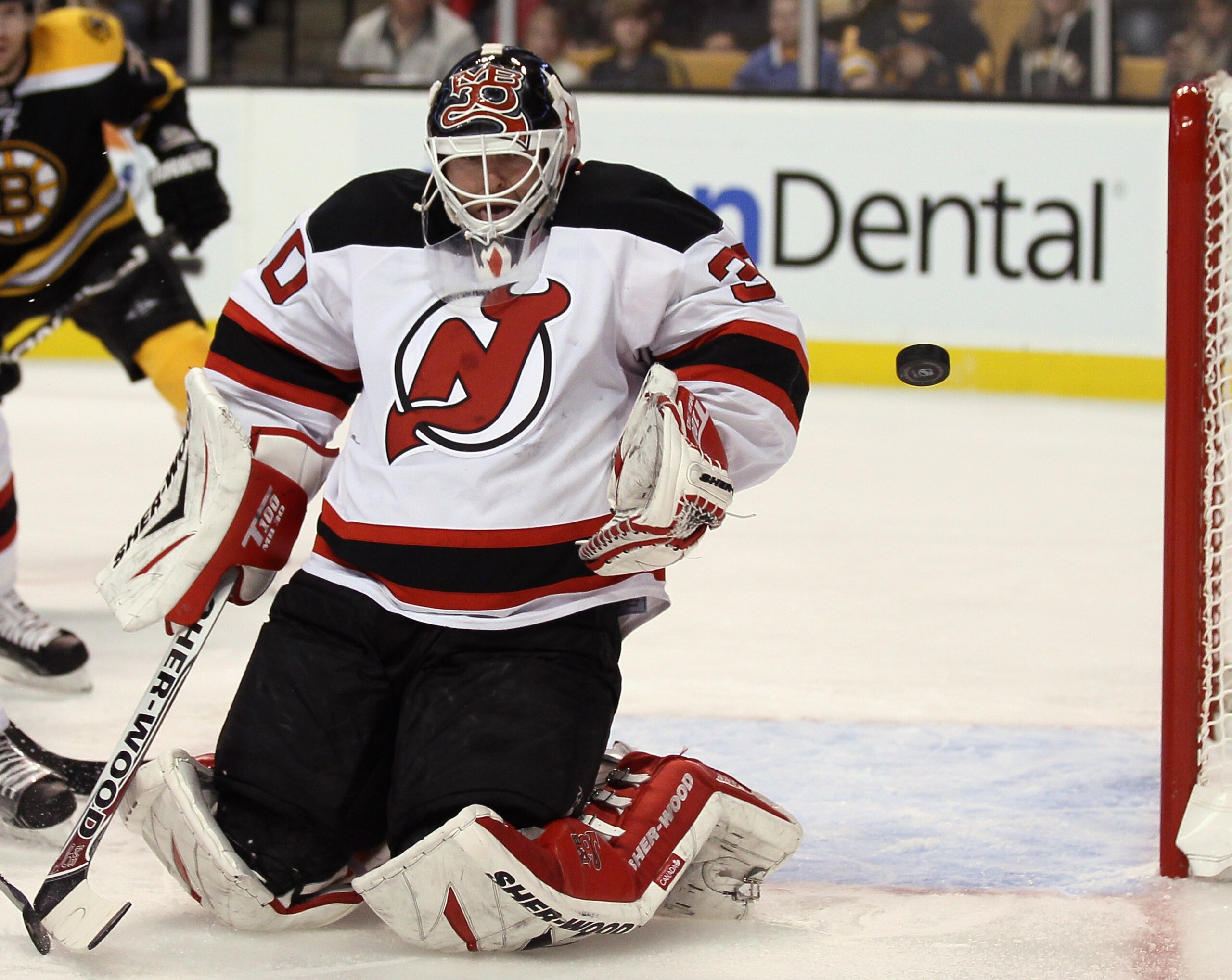 BOSTON - NOVEMBER 15:  Martin Brodeur #30 of the New Jersey Devils stops a shot in the first period against the Boston Bruins on November 15, 2010 at the TD Garden in Boston, Massachusetts.  (Photo by Elsa/Getty Images)