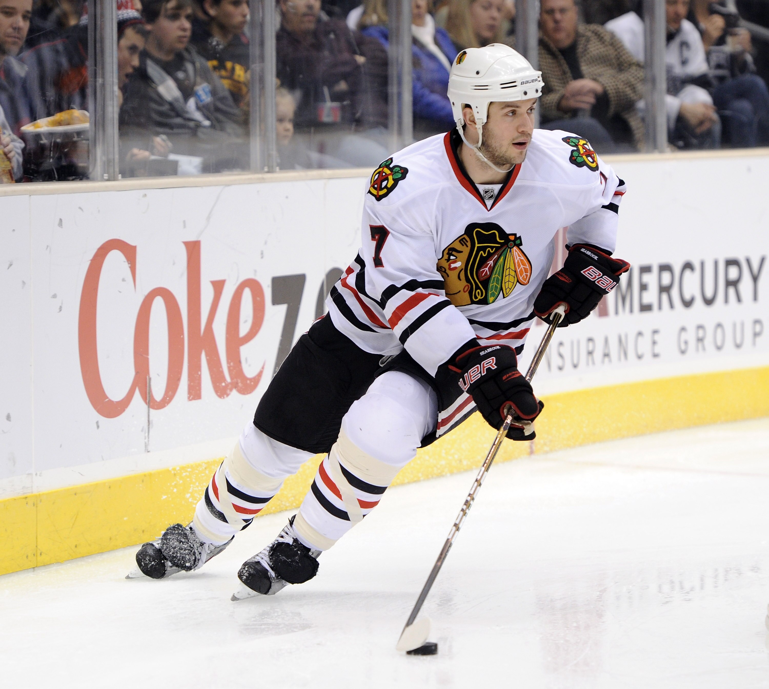 LOS ANGELES, CA - NOVEMBER 27:  Brent Seabrook #7 of the Chicago Blackhawks looks to pass during the game against the Los Angeles Kings at Staples Center on November 27, 2010 in Los Angeles, California.  (Photo by Harry How/Getty Images)