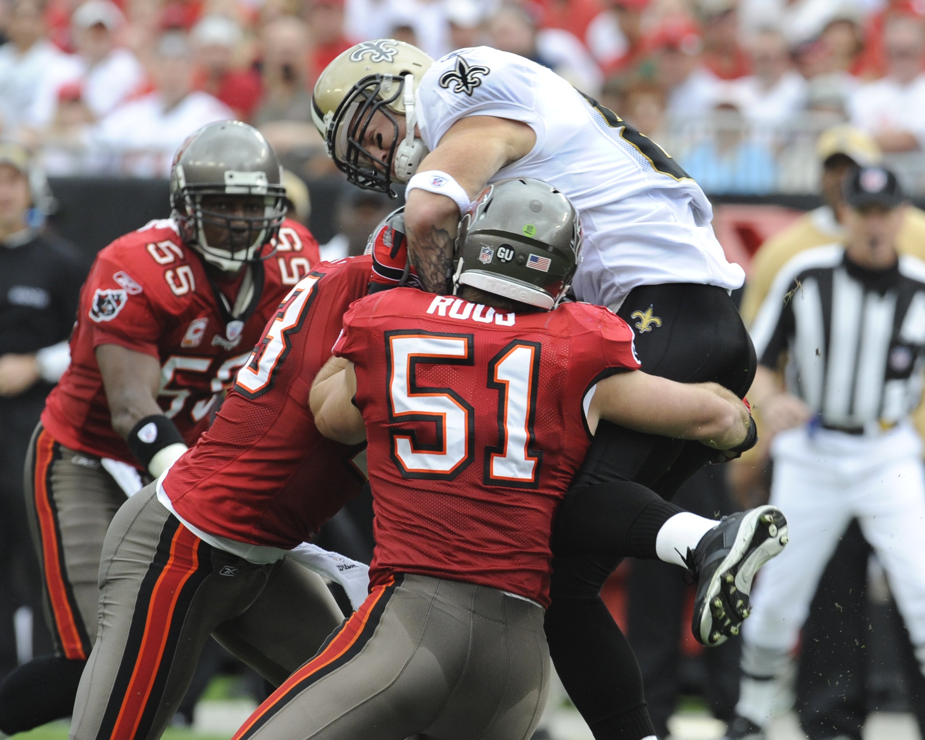 TAMPA, FL - NOVEMBER 30: Linebacker Barrett Ruud #51 of the Tampa Bay Buccaneers tackles tight end Jeremy Shockey #88 of the New Orleans Saints at Raymond James Stadium on November 30, 2008 in Tampa, Florida.  (Photo by Al Messerschmidt/Getty Images)