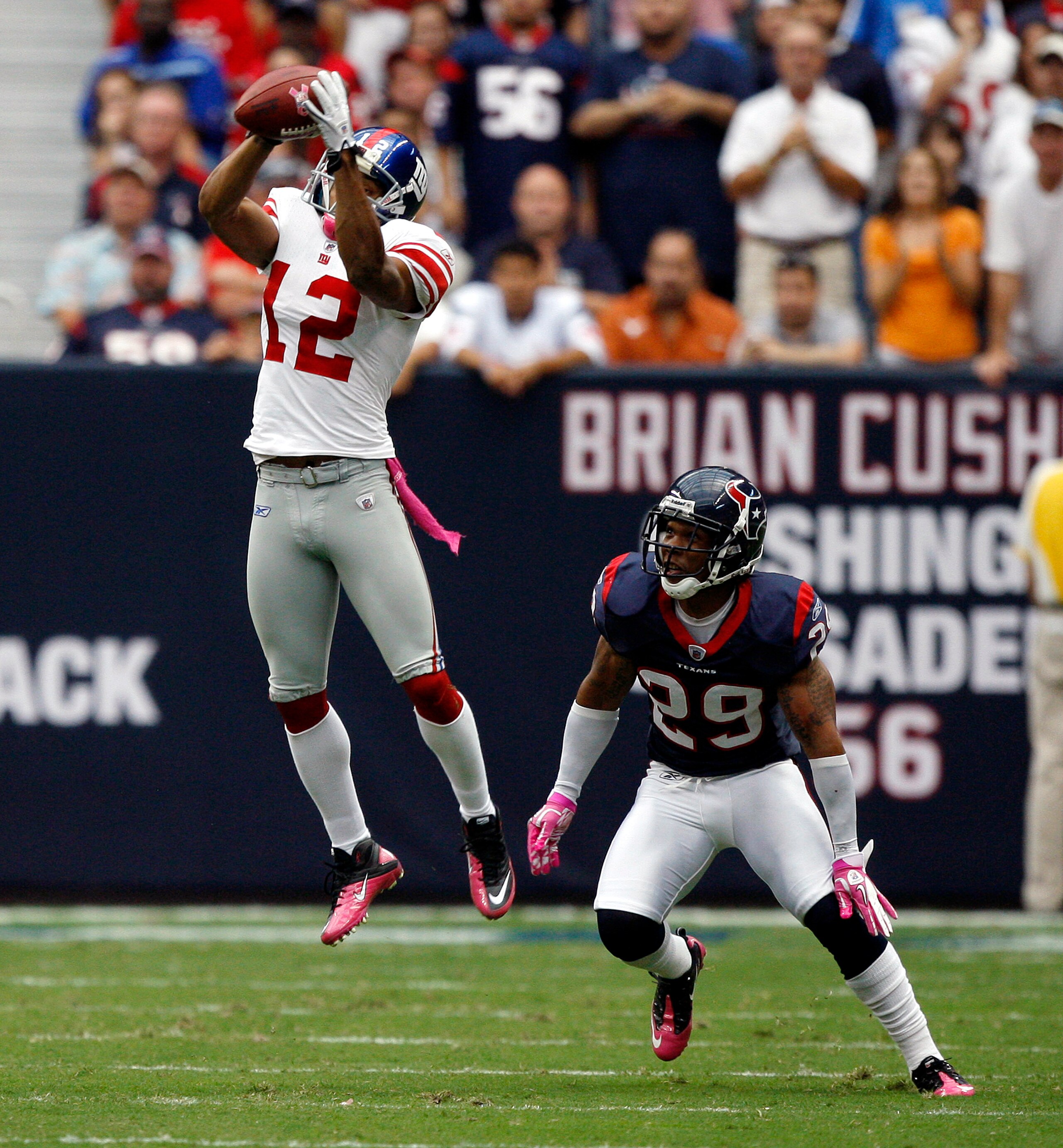 HOUSTON - OCTOBER 10: Wide receiver Steve Smith #12 of the New York Giants goes up high in front of cornerback Glover Quin #29 of the Houston Texans in the first half at Reliant Stadium on October 10, 2010 in Houston, Texas. (Photo by Bob Levey/Getty Im HOUSTON - OCTOBER 10: Wide receiver Steve Smith #12 of the New York Giants goes up high in front of cornerback Glover Quin #29 of the Houston Texans in the first half at Reliant Stadium on October 10, 2010 in Houston, Texas. (Photo by Bob Levey/Getty Im