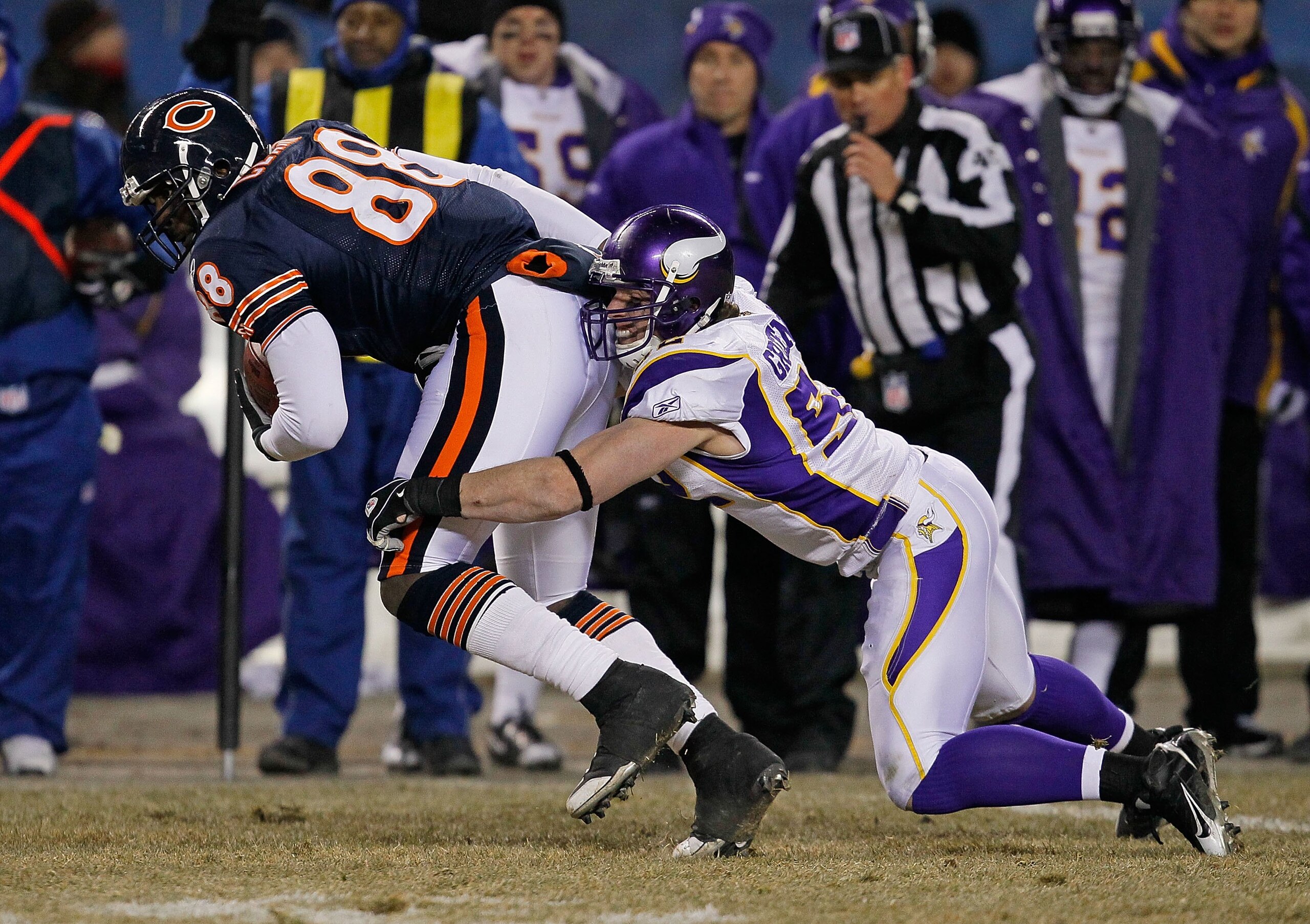 CHICAGO - DECEMBER 28: Desmond Clark #88 of the Chicago Bears tries to break away from Chad Greenway #52 of the Minnesota Vikings at Soldier Field on December 28, 2009 in Chicago, Illinois. The Bears defeated the Vikings 36-30 in overtime. (Photo by Jonat CHICAGO - DECEMBER 28: Desmond Clark #88 of the Chicago Bears tries to break away from Chad Greenway #52 of the Minnesota Vikings at Soldier Field on December 28, 2009 in Chicago, Illinois. The Bears defeated the Vikings 36-30 in overtime. (Photo by Jonat