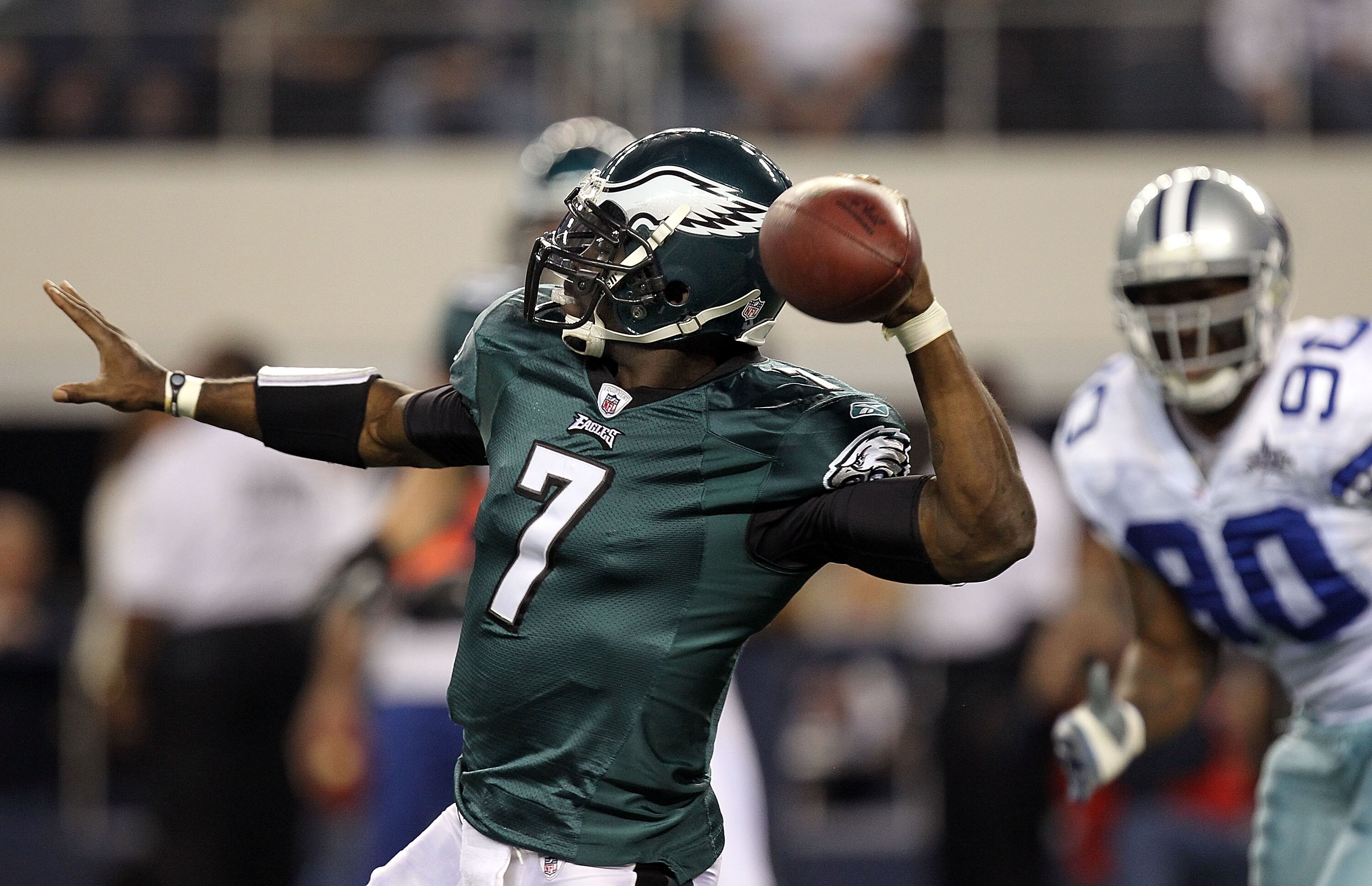 ARLINGTON, TX - DECEMBER 12: Quarterback Michael Vick #7 of the Philadelphia Eagles drops back to pass against the Dallas Cowboys at Cowboys Stadium on December 12, 2010 in Arlington, Texas. (Photo by Ronald Martinez/Getty Images) ARLINGTON, TX - DECEMBER 12: Quarterback Michael Vick #7 of the Philadelphia Eagles drops back to pass against the Dallas Cowboys at Cowboys Stadium on December 12, 2010 in Arlington, Texas. (Photo by Ronald Martinez/Getty Images)