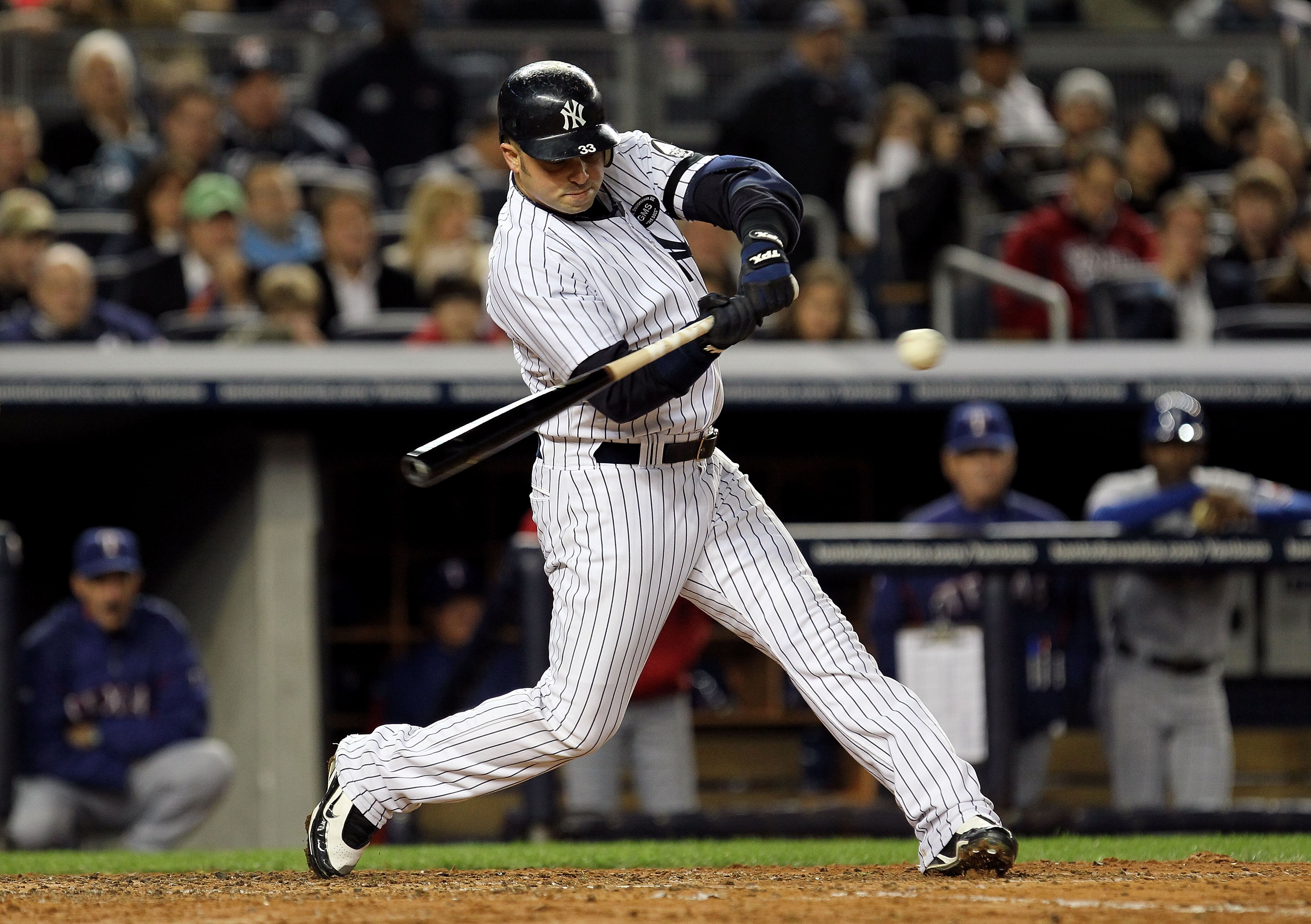 NEW YORK - OCTOBER 18:  Nick Swisher #33 of the New York Yankees bats against the Texas Rangers in Game Three of the ALCS during the 2010 MLB Playoffs at Yankee Stadium on October 18, 2010 in New York, New York. The Rangers won 8-0.  (Photo by Al Bello/Ge