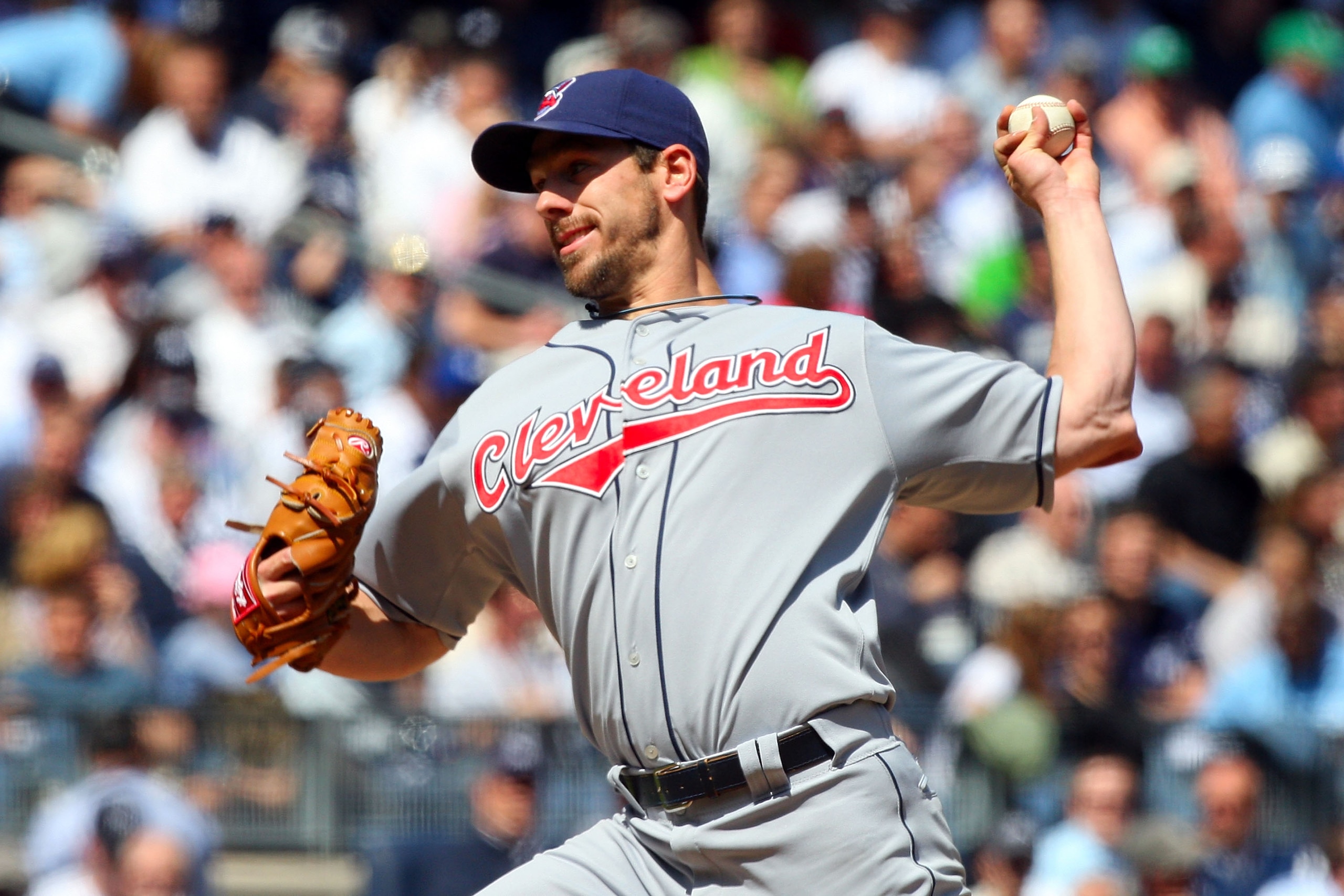 NEW YORK - APRIL 16:  Cliff Lee #31 of the Cleveland Indians pitches against the New York Yankees during opening day at the new Yankee Stadium on April 16, 2009 in the Bronx borough of New York City. This is the first regular season MLB game being played