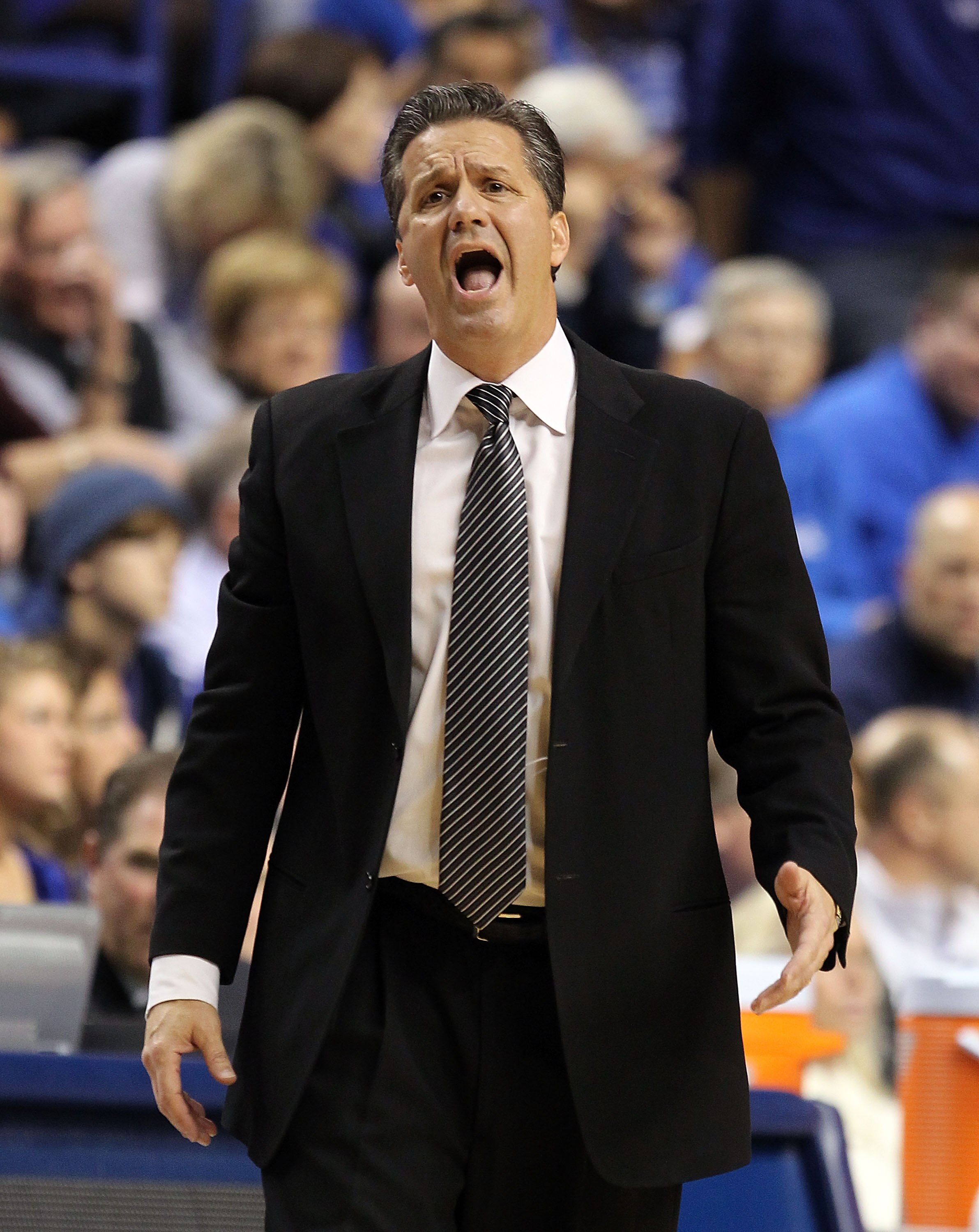 LEXINGTON, KY - DECEMBER 11:  John Calipari the Head Coach of the Kentucky Wildcats gives instructions to his team during the 81-62 victory over the Indiana Hoosiers on December 11, 2010 in Lexington, Kentucky.  (Photo by Andy Lyons/Getty Images)