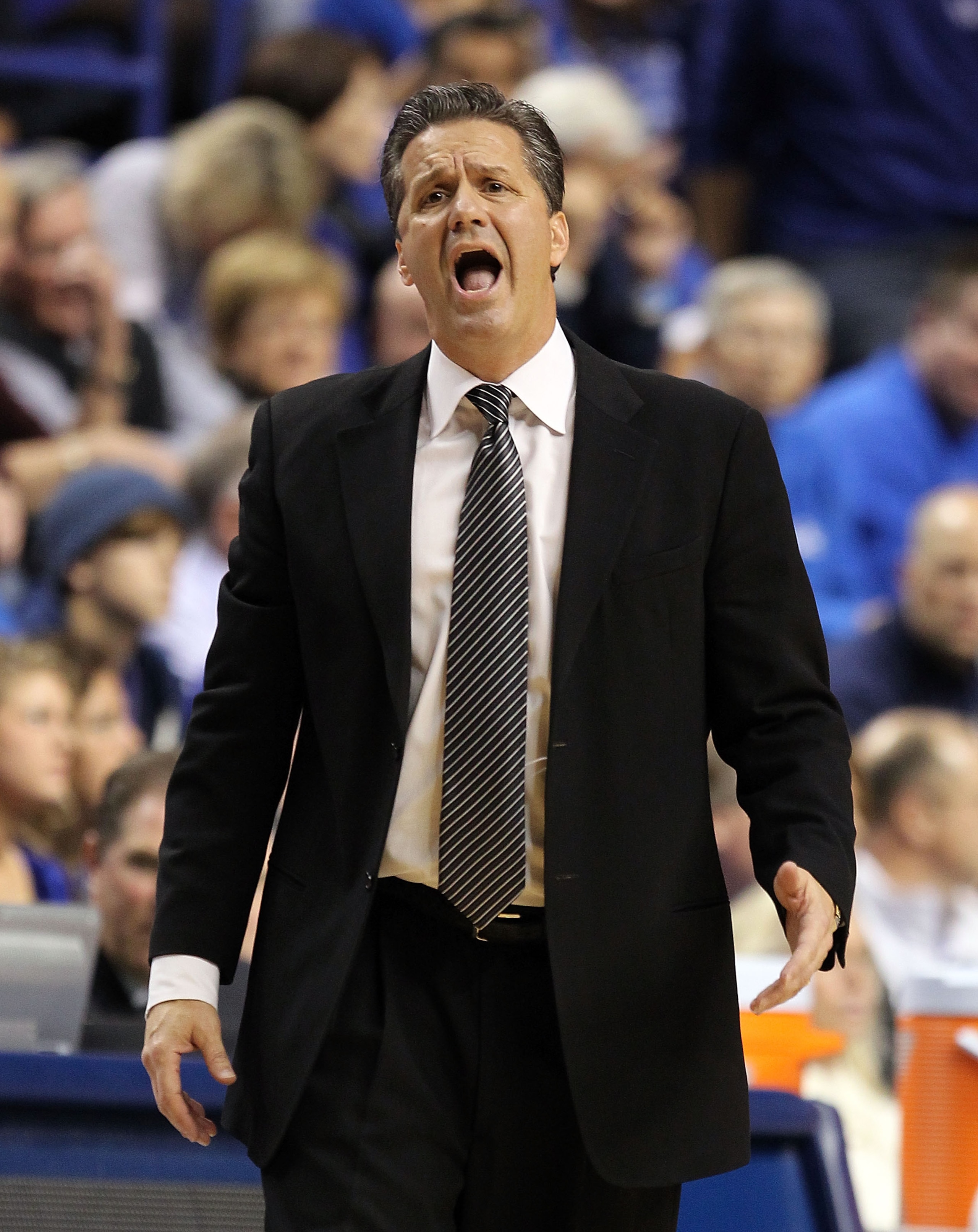 LEXINGTON, KY - DECEMBER 11:  John Calipari the Head Coach of the Kentucky Wildcats gives instructions to his team during the 81-62 victory over the Indiana Hoosiers on December 11, 2010 in Lexington, Kentucky.  (Photo by Andy Lyons/Getty Images)
