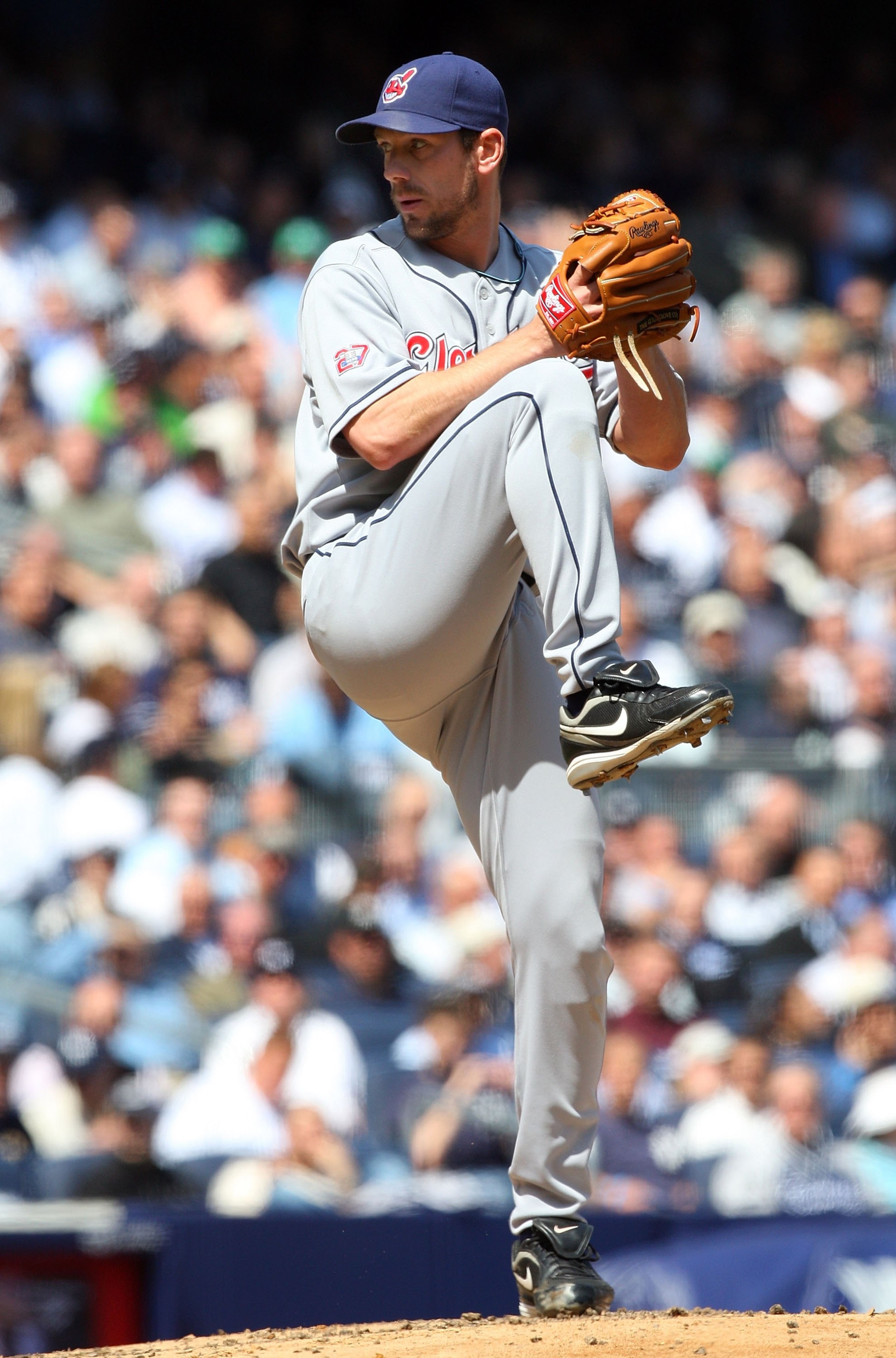 NEW YORK - APRIL 16:  Cliff Lee #31 of the Cleveland Indians pitches against the New York Yankees during opening day at the new Yankee Stadium on April 16, 2009 in the Bronx borough of New York City. This is the first regular season MLB game being played 
