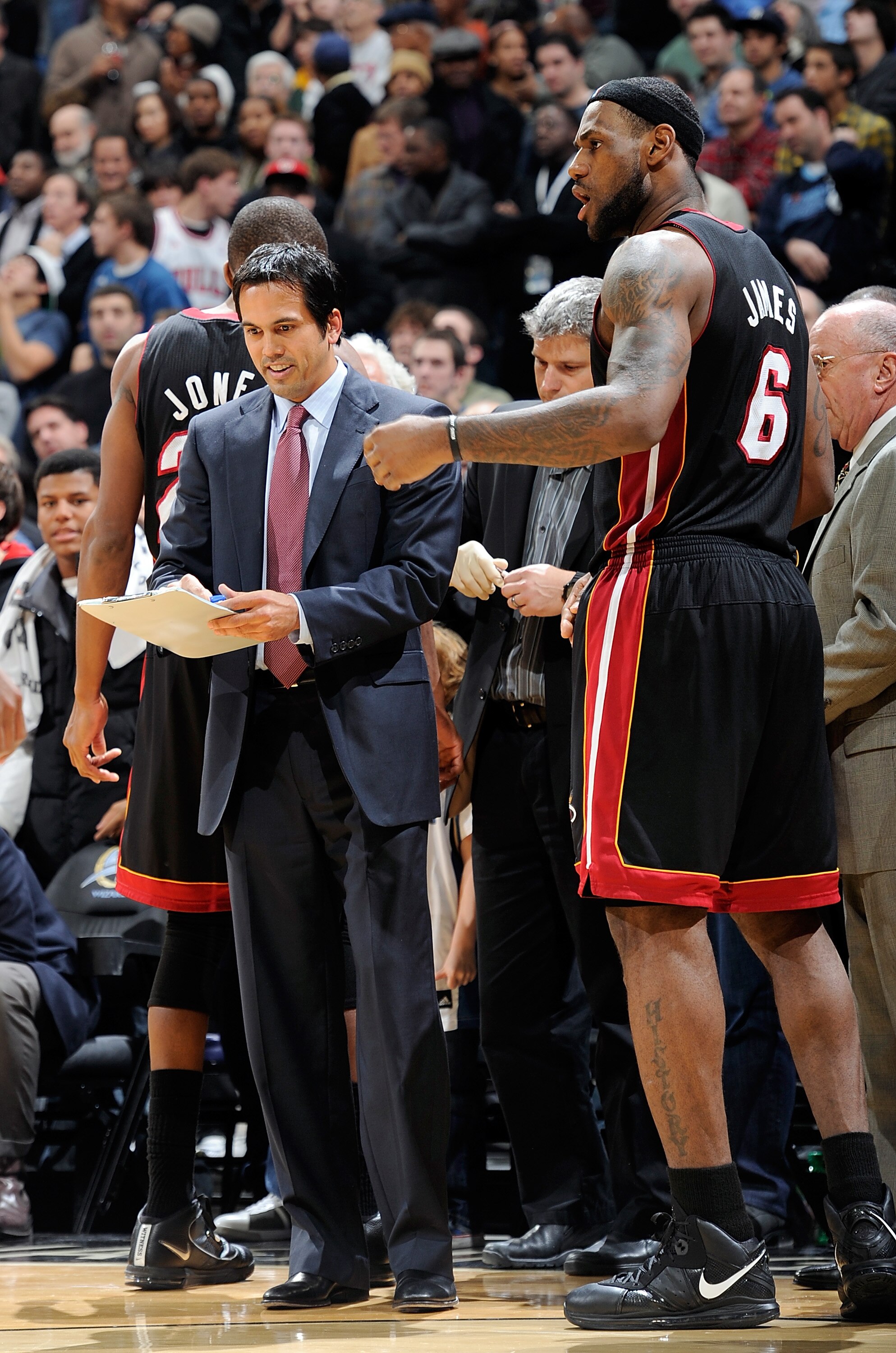WASHINGTON, DC - DECEMBER 18:  Head coach Eric Spoelstra of the Miami Heat talks with LeBron James #6 during a timeout in the game against the Washington Wizards at the Verizon Center on December 18, 2010 in Washington, DC. NOTE TO USER: User expressly ac