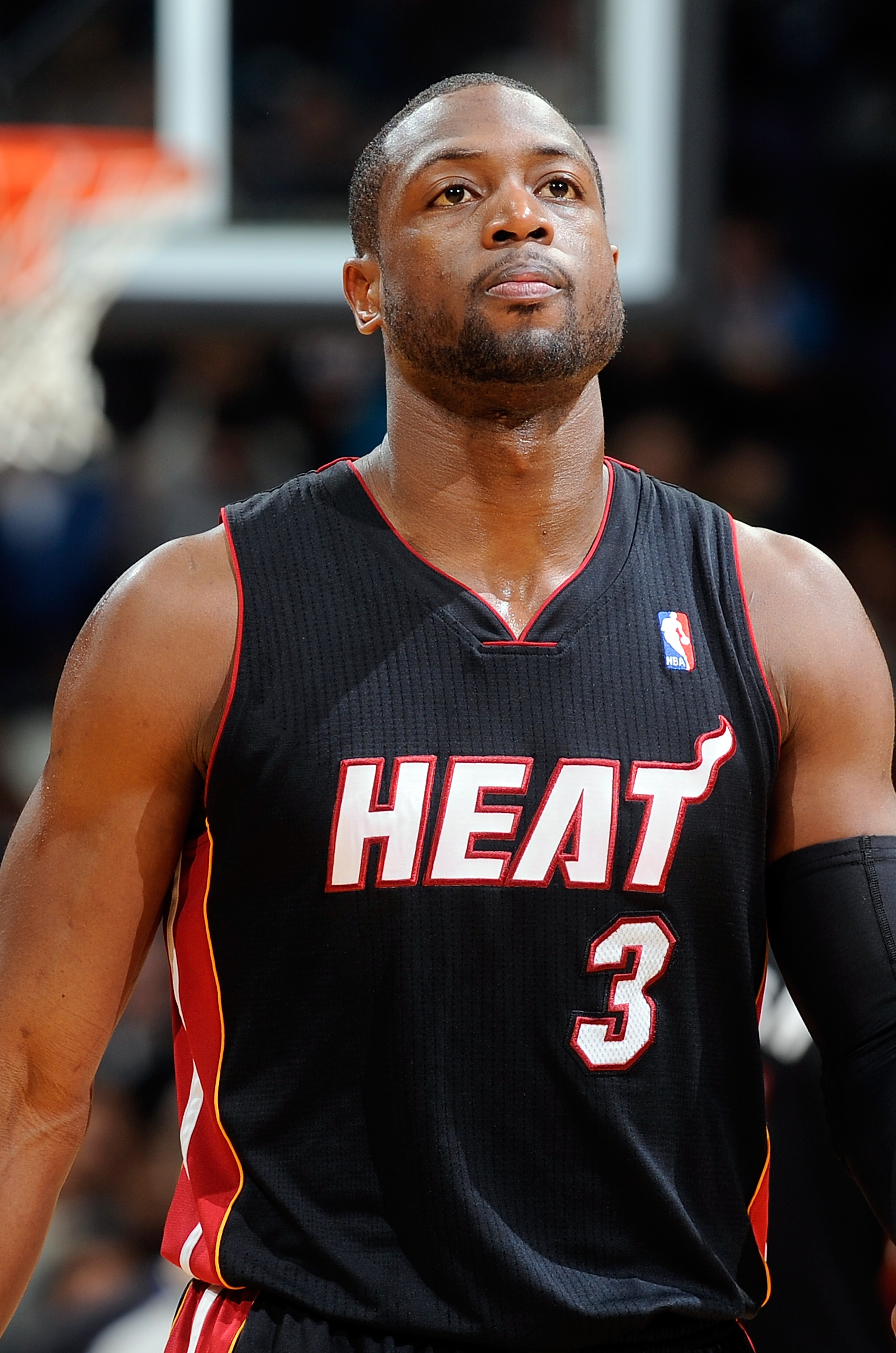 WASHINGTON, DC - DECEMBER 18:  Dwyane Wade #3 of the Miami Heat rests during a break in the game against the Washington Wizards at the Verizon Center on December 18, 2010 in Washington, DC. NOTE TO USER: User expressly acknowledges and agrees that, by dow