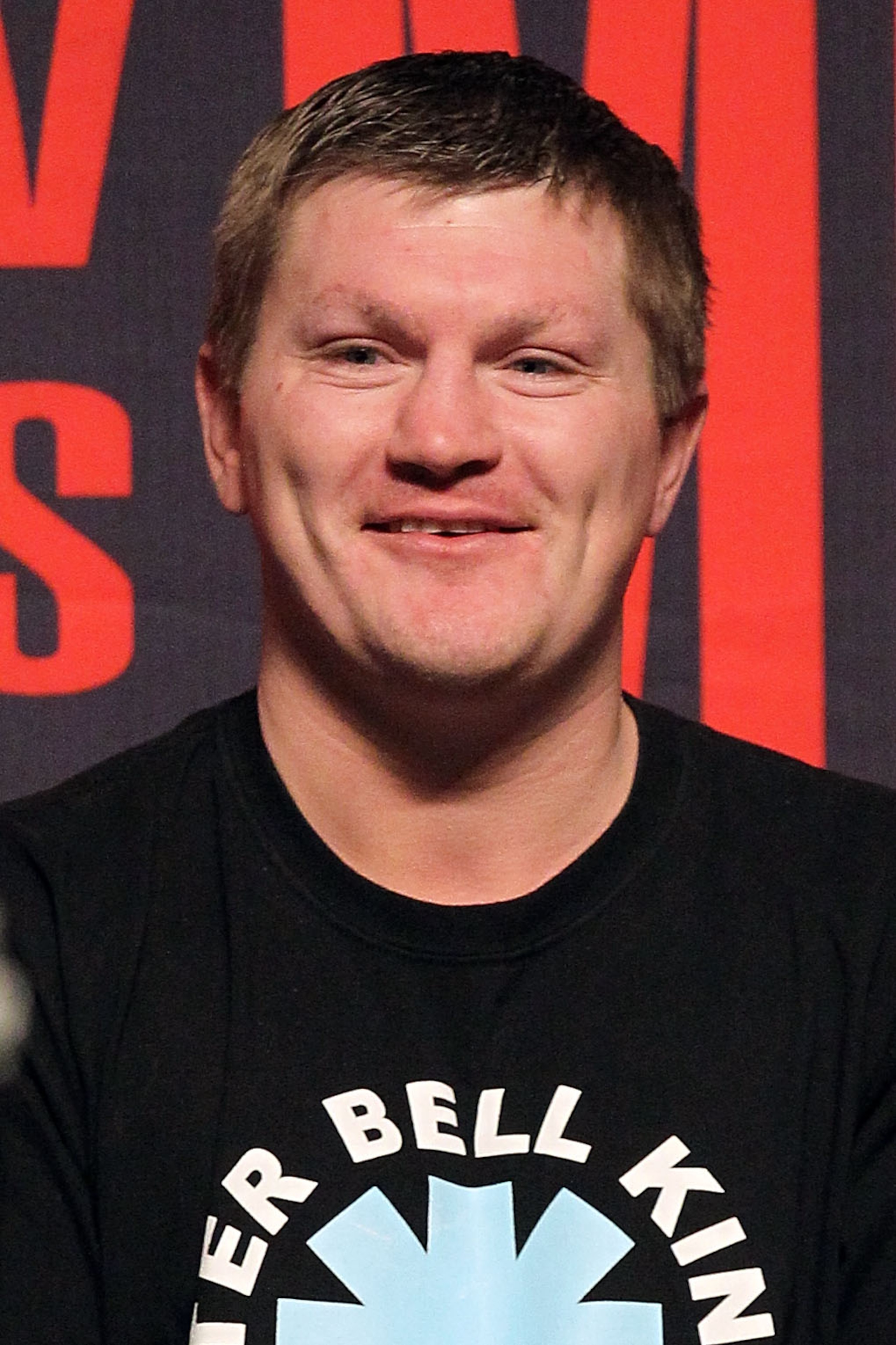 LAS VEGAS - APRIL 30:  Boxer Ricky Hatton smiles from the stage before the start of the Floyd Mayweather Jr. and Shane Mosley weigh-in at the MGM Grand Garden Arena on April 30, 2010 in Las Vegas, Nevada. Mayweather and Mosley will meet in a 12-round welt