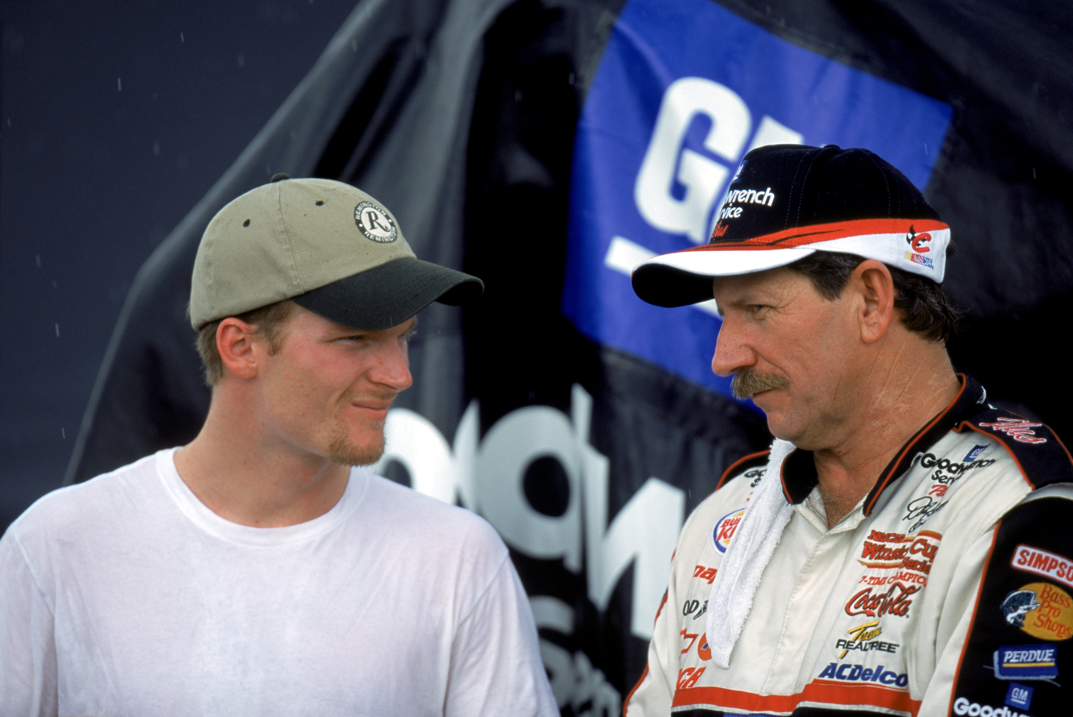 DARLINGTON, SC - SEPTEMBER 3:  Dale Earnhardt Jr. and Dale Earnhardt Sr. pose for a photograph after the Pepsi Southern 500 at the Darlington Raceway on September 3, 2000 in Darlington, South Carolina.  (Photo by Craig Jones/Getty Images)