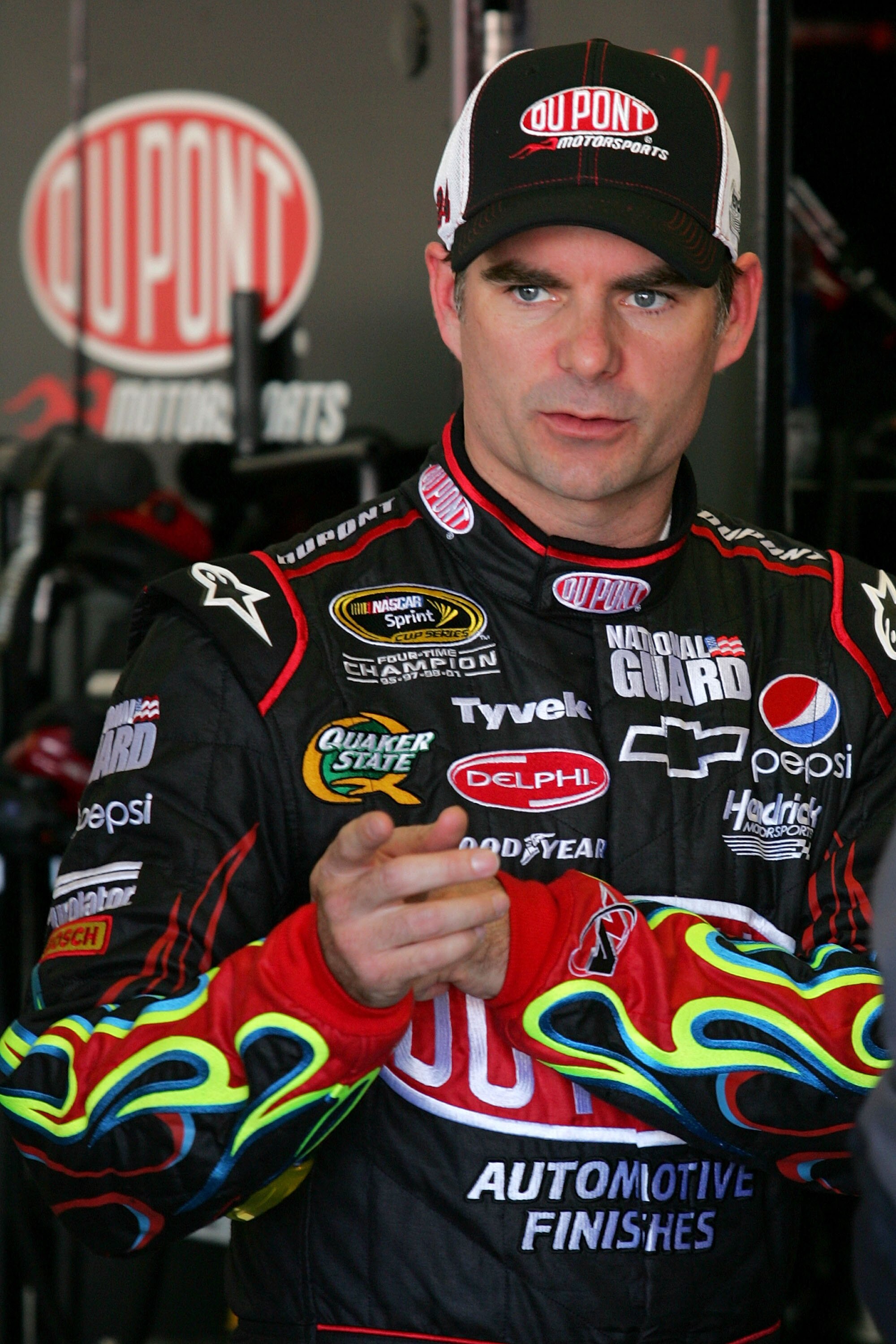 DAYTONA BEACH, FL - FEBRUARY 10:  Jeff Gordon, driver of the #24 DuPont Chevrolet, looks on in the garage during practice for the NASCAR Sprint Cup Series Daytona 500 at Daytona International Speedway on February 10, 2010 in Daytona Beach, Florida.  (Phot