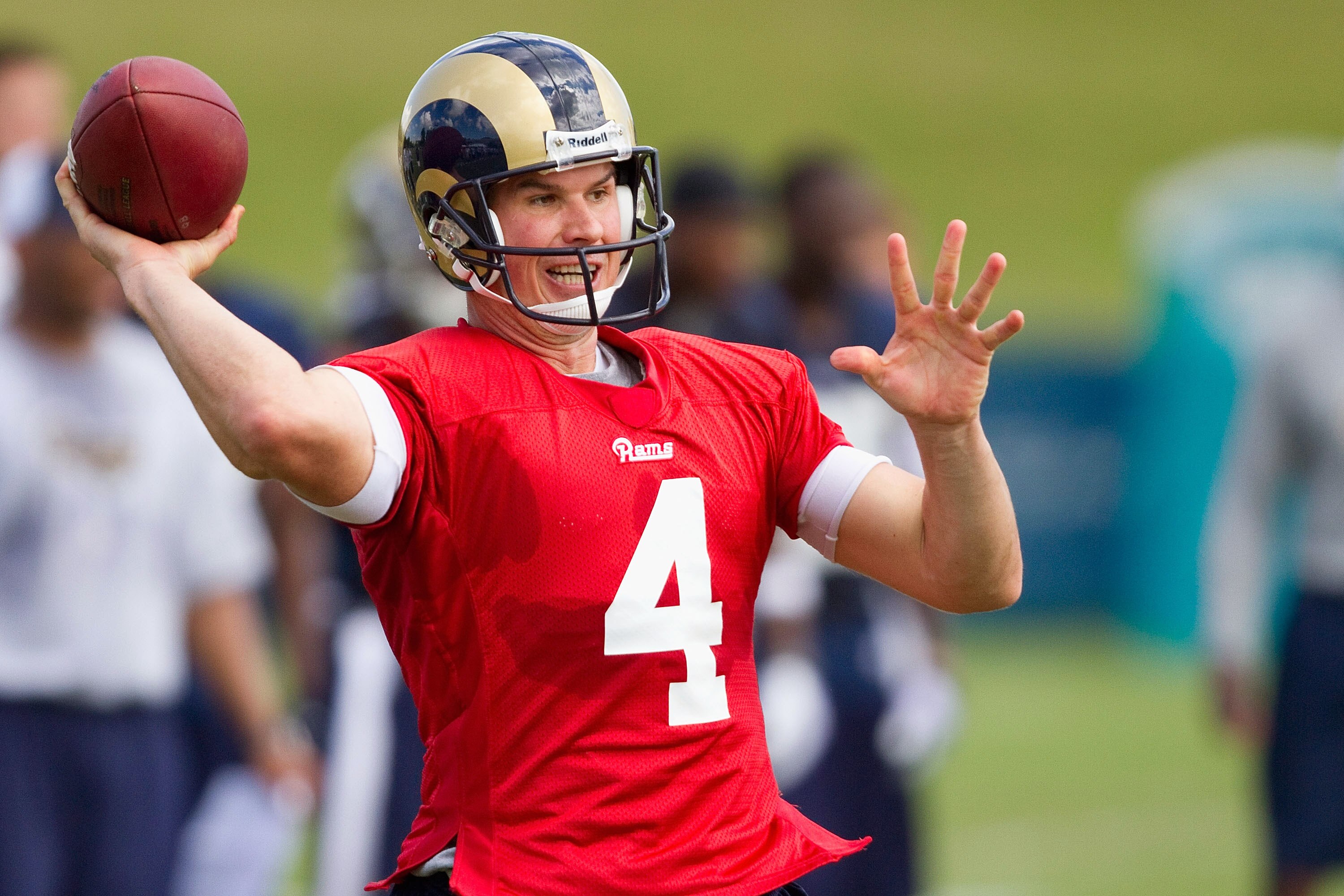 EARTH CITY, MO - JULY 31: A.J. Feeley #4 of the St. Louis Rams passes during training camp at the Russell Athletic Training Facility on July 31, 2010 in Earth City, Missouri.  (Photo by Dilip Vishwanat/Getty Images)