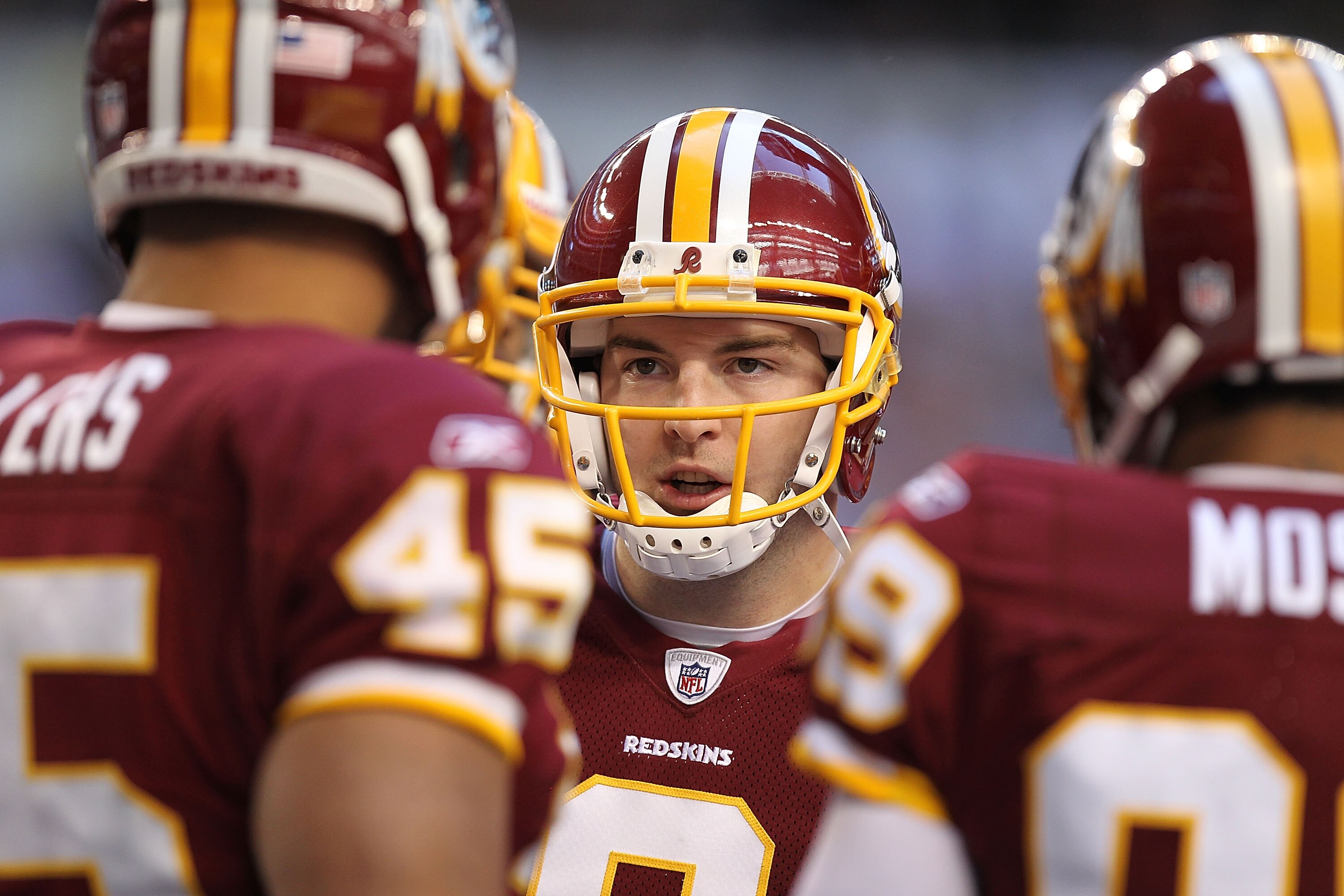 ARLINGTON, TX - DECEMBER 19:  Quarterback Rex Grossman #8 of the Washington Redskins during play against the Dallas Cowboys at Cowboys Stadium on December 19, 2010 in Arlington, Texas.  (Photo by Ronald Martinez/Getty Images)