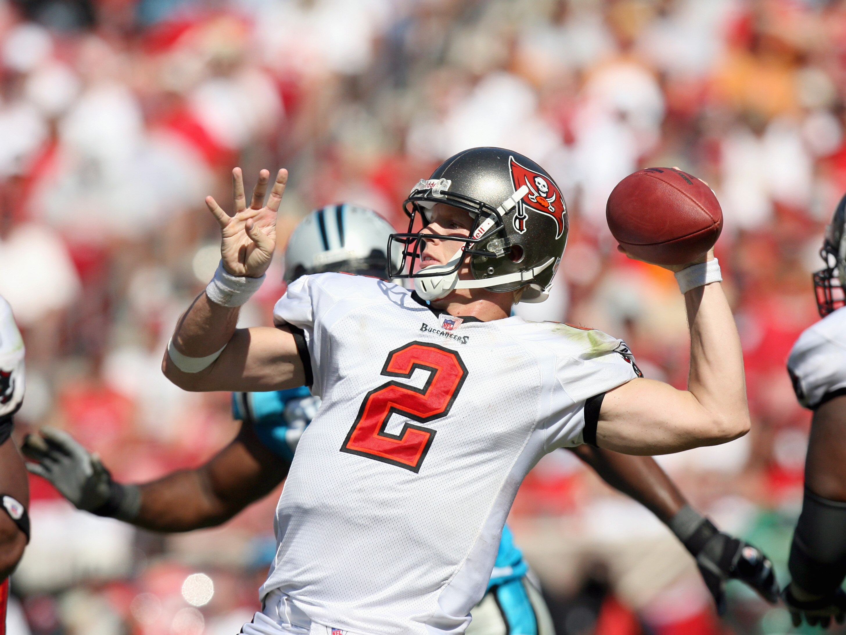 TAMPA, FL - SEPTEMBER 24:  Quarterback Chris Simms #2 of the Tampa Bay Buccaneers passes the ball during the game against the Carolina Panthers at Raymond James Stadium on September 24, 2006 in Tampa, Florida. The Panthers defeated the Buccaneers 26-24. (