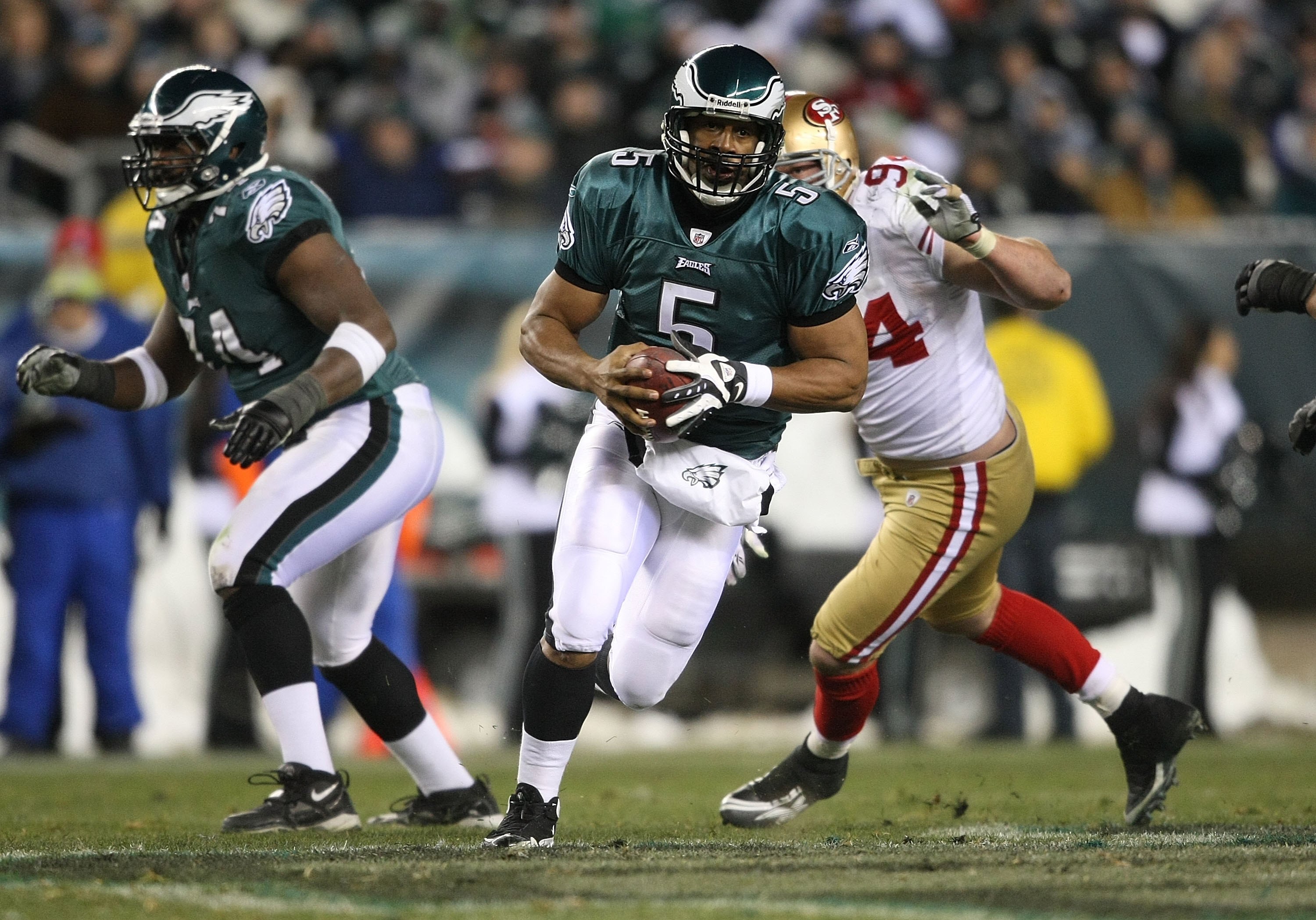PHILADELPHIA - DECEMBER 20:  Donovan McNabb #5 of the Philadelphia Eagles rushes against the San Francisco 49ers at Lincoln Financial Field on December 20, 2009 in Philadelphia, Pennsylvania.  (Photo by Nick Laham/Getty Images)