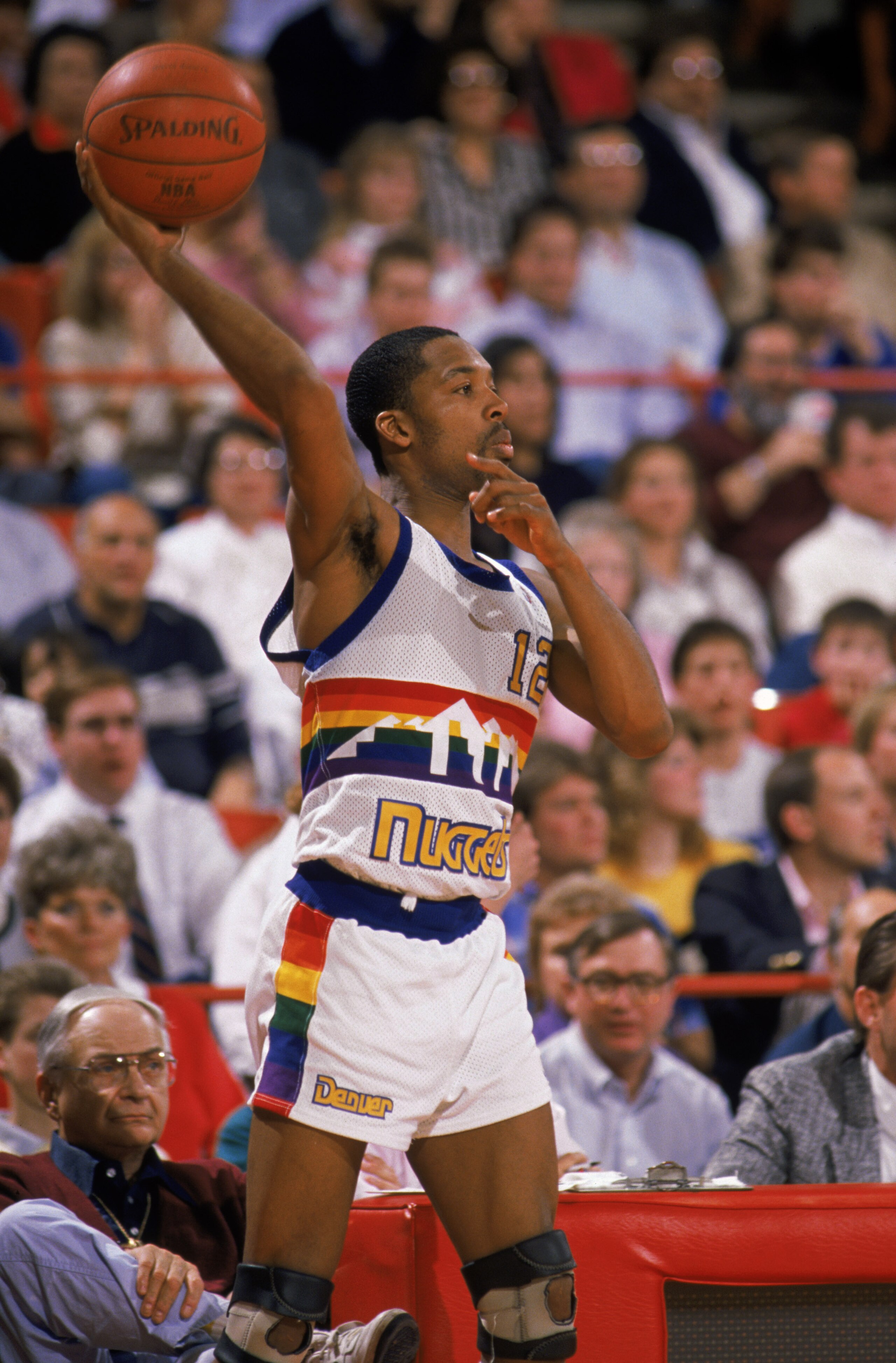 DENVER, CO- 1988:  Fat Lever #12 of the Denver Nuggets throws the ball during a game in the 1988 -1989 NBA Season. NOTE TO USER: User expressly acknowledges and agrees that, by downloading and/or using this Photograph, User is consenting to the terms and