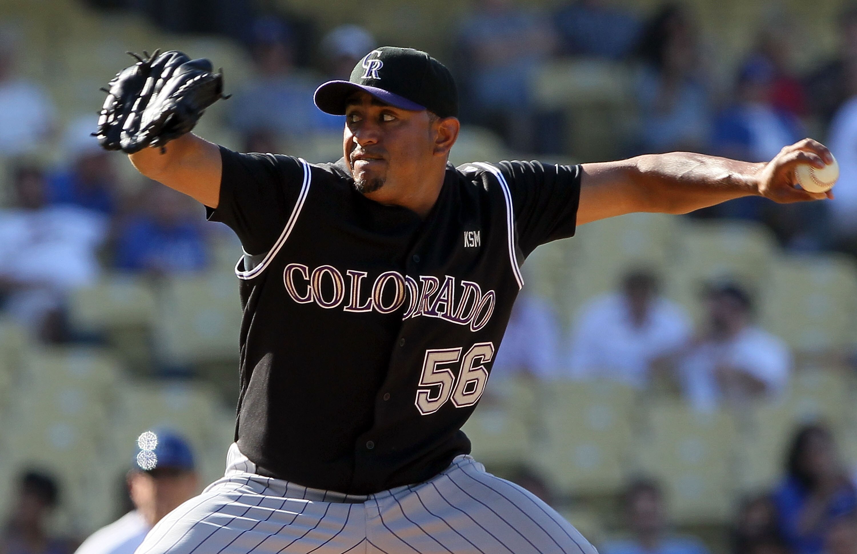 LOS ANGELES, CA - SEPTEMBER 18:  Franklin Morales #56 of the Colorado Rockies pitches against the Los Angeles Dodgers in the game at Dodger Stadium on September 18, 2010 in Los Angeles, California.  (Photo by Jeff Gross/Getty Images)