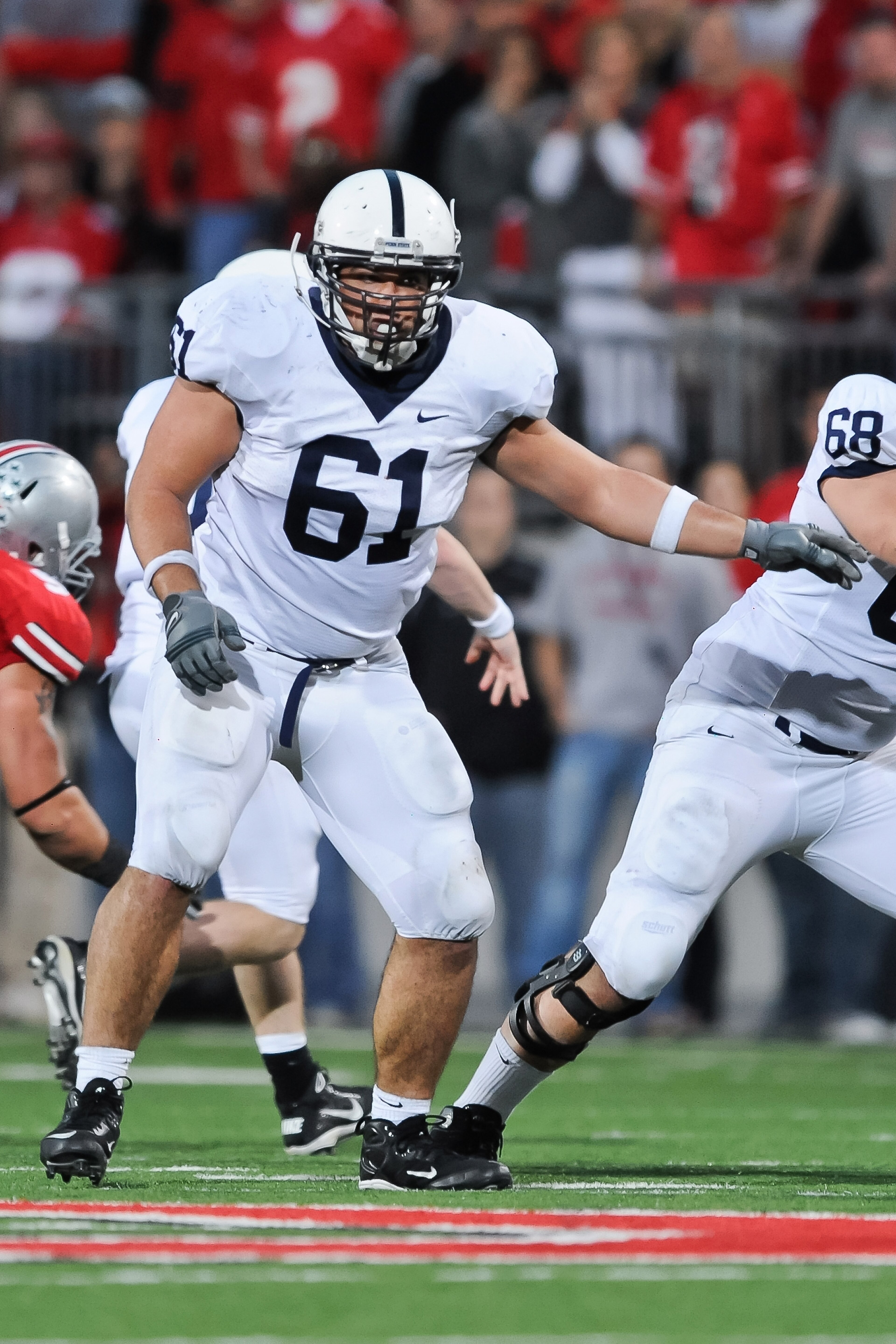 COLUMBUS, OH - NOVEMBER 13:  Stefan Wisniewski #61 of the Penn State Nittany Lions blocks against the Ohio State Buckeyes at Ohio Stadium on November 13, 2010 in Columbus, Ohio.  (Photo by Jamie Sabau/Getty Images)