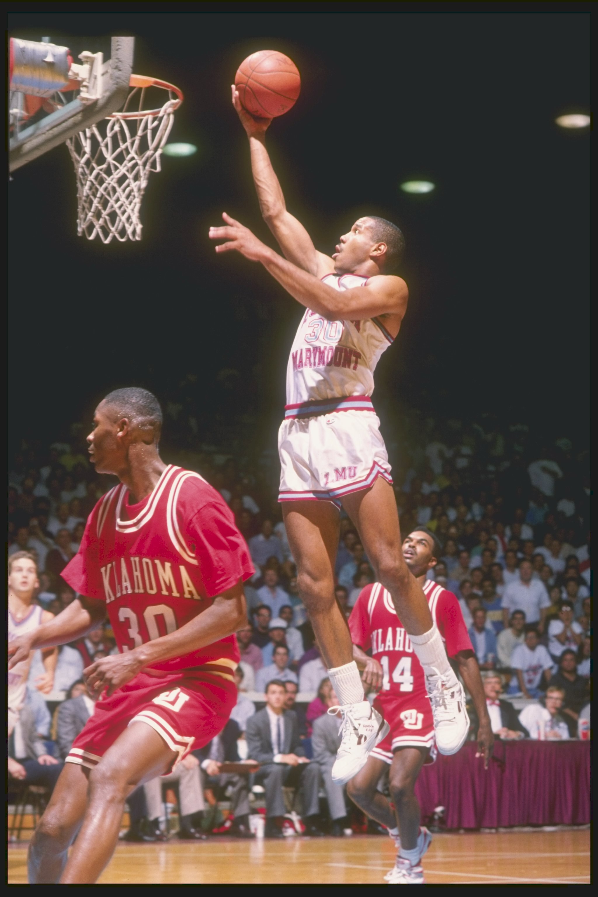 1990:  Guard Bo Kimble of the Loyola-Marymount Lions lays up the ball during a game. Mandatory Credit: Mike Powell  /Allsport