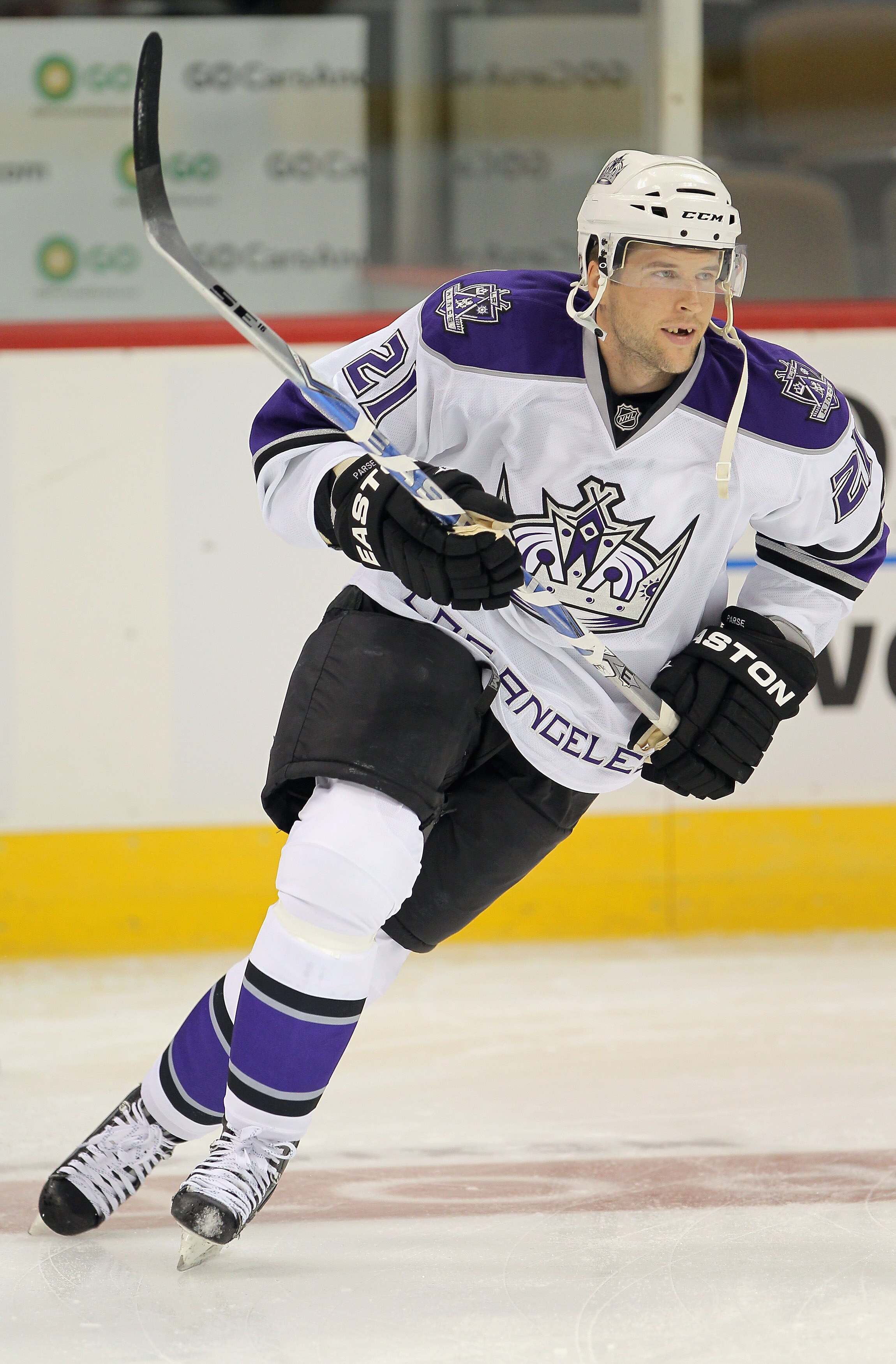 DENVER - SEPTEMBER 22:  Scott Parse #21 of the Los Angeles Kings skates during warm up prior to facing the Colorado Avalanche during preseason NHL action at the Pepsi Center on September 22, 2010 in Denver, Colorado. The Kings defeated the Avalanche 4-2.