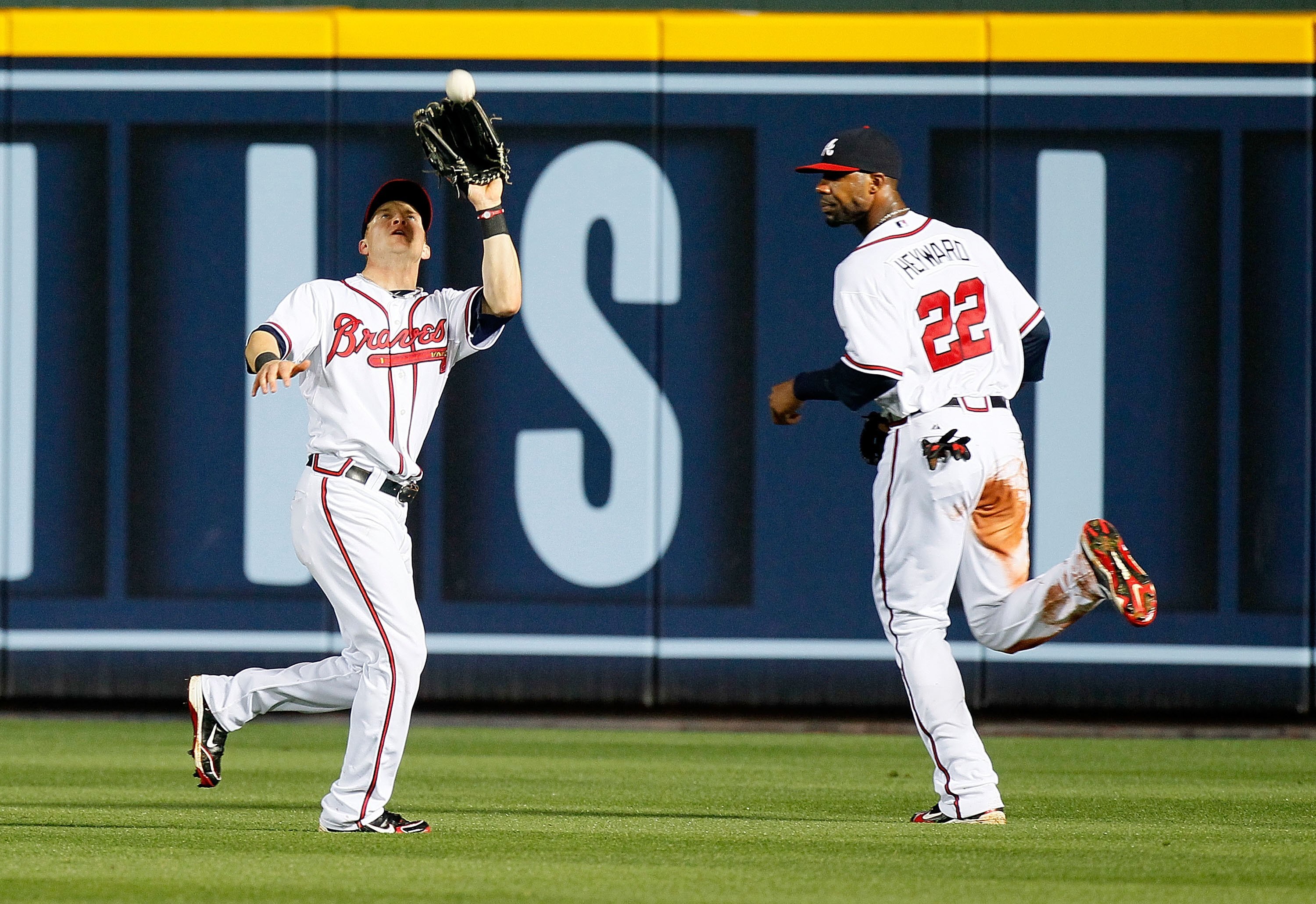 ATLANTA - MAY 28:  Nate McClouth #24 and Jason Heyward #22 of the Atlanta Braves against the Pittsburgh Pirates at Turner Field on May 28, 2010 in Atlanta, Georgia.  (Photo by Kevin C. Cox/Getty Images)
