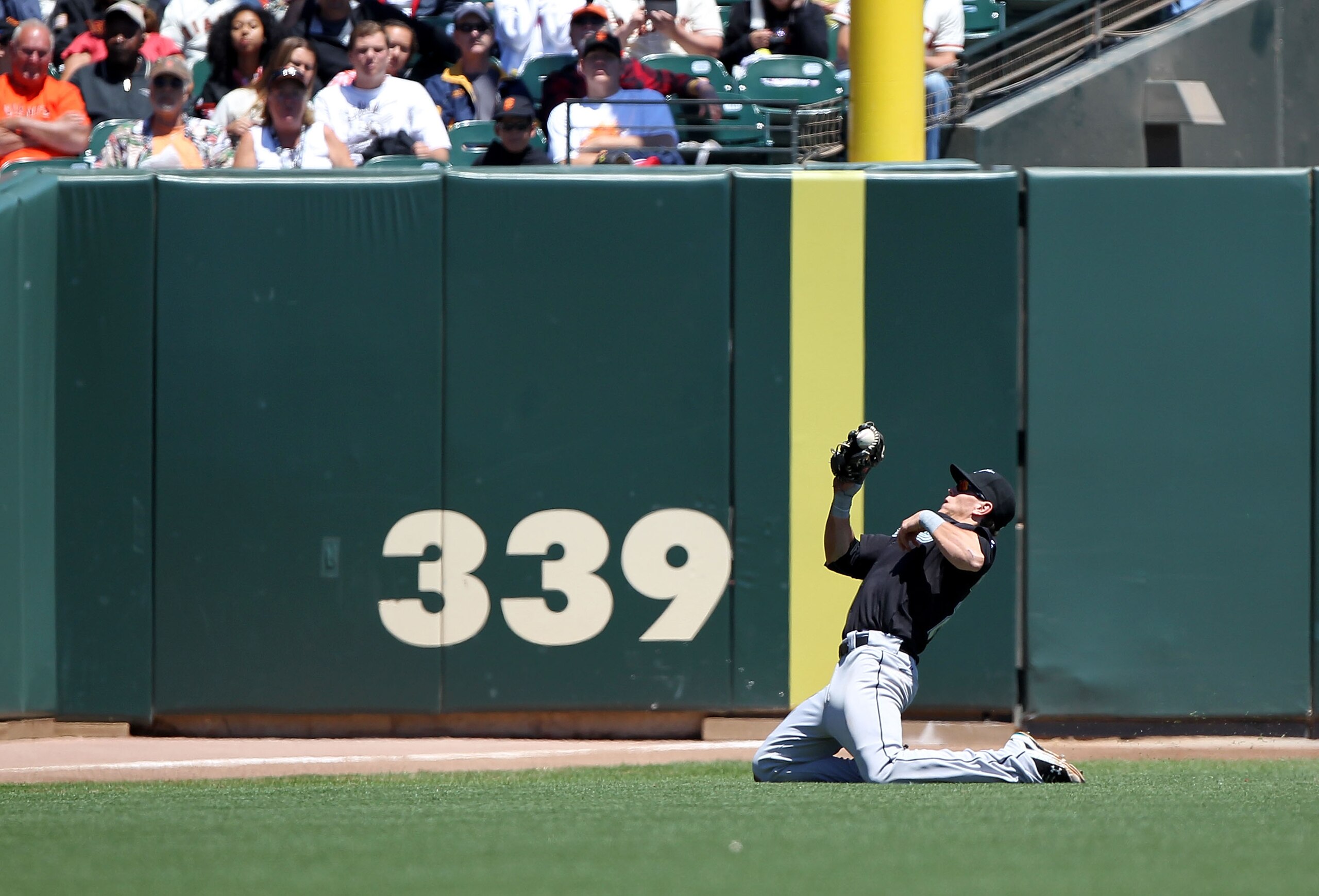 SAN FRANCISCO - JULY 29:  Logan Morrison #20 of the Florida Marlins catches a ball hit by Aubrey Huff #17 of the San Francisco Giants in the first inning during an MLB game at AT&T Park on July 29, 2010 in San Francisco, California.  (Photo by Jed Jacobso