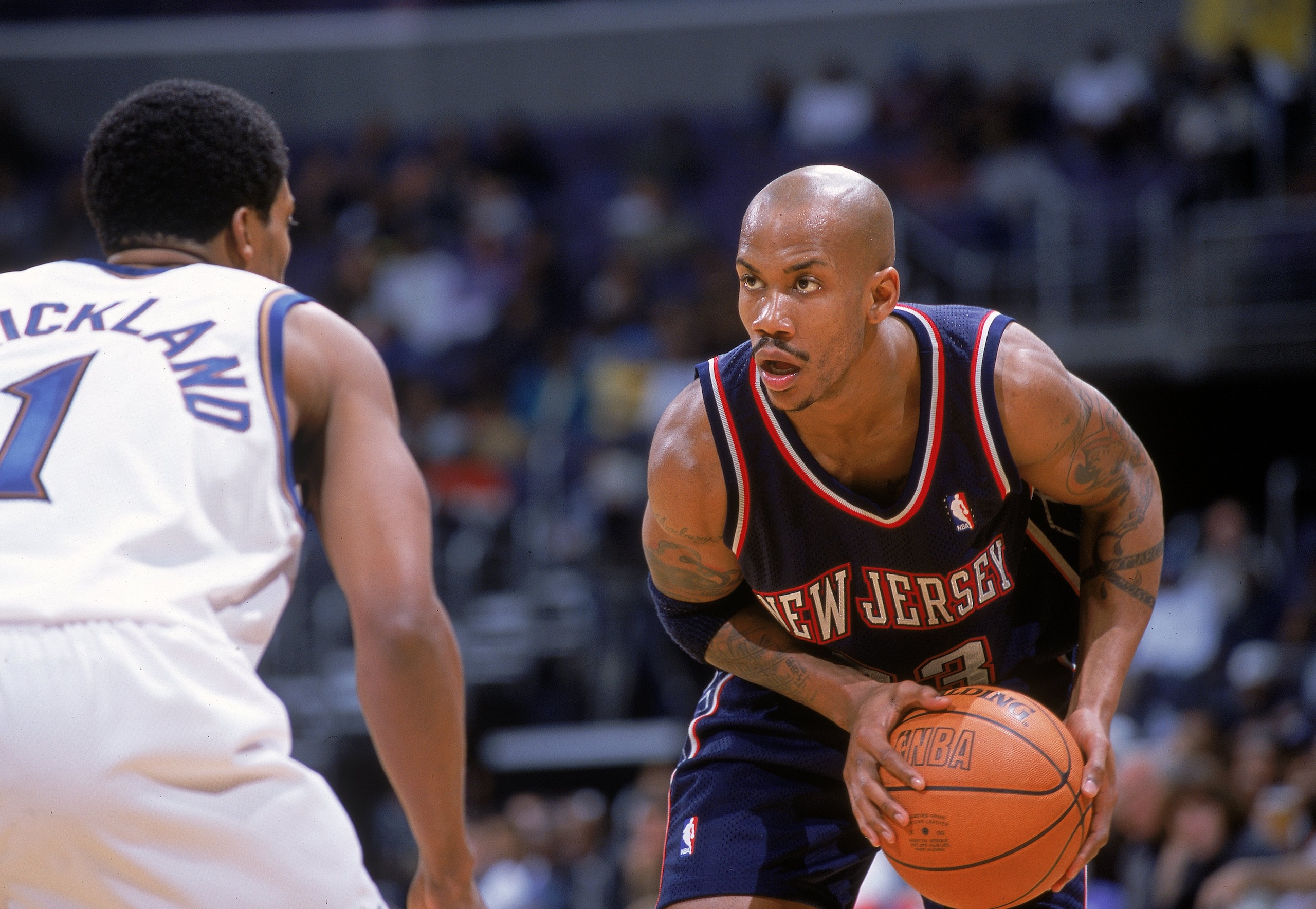 8 Nov 2000: Stephen Marbury #33 of the New Jersey Nets looks to move as he is guarded by Rod Strickland #1 of the Washington Wizards at the MCI Center in Washington, D.C.  The Nets defeated the Wizards 102-86. NOTE TO USER: It is expressly understood that