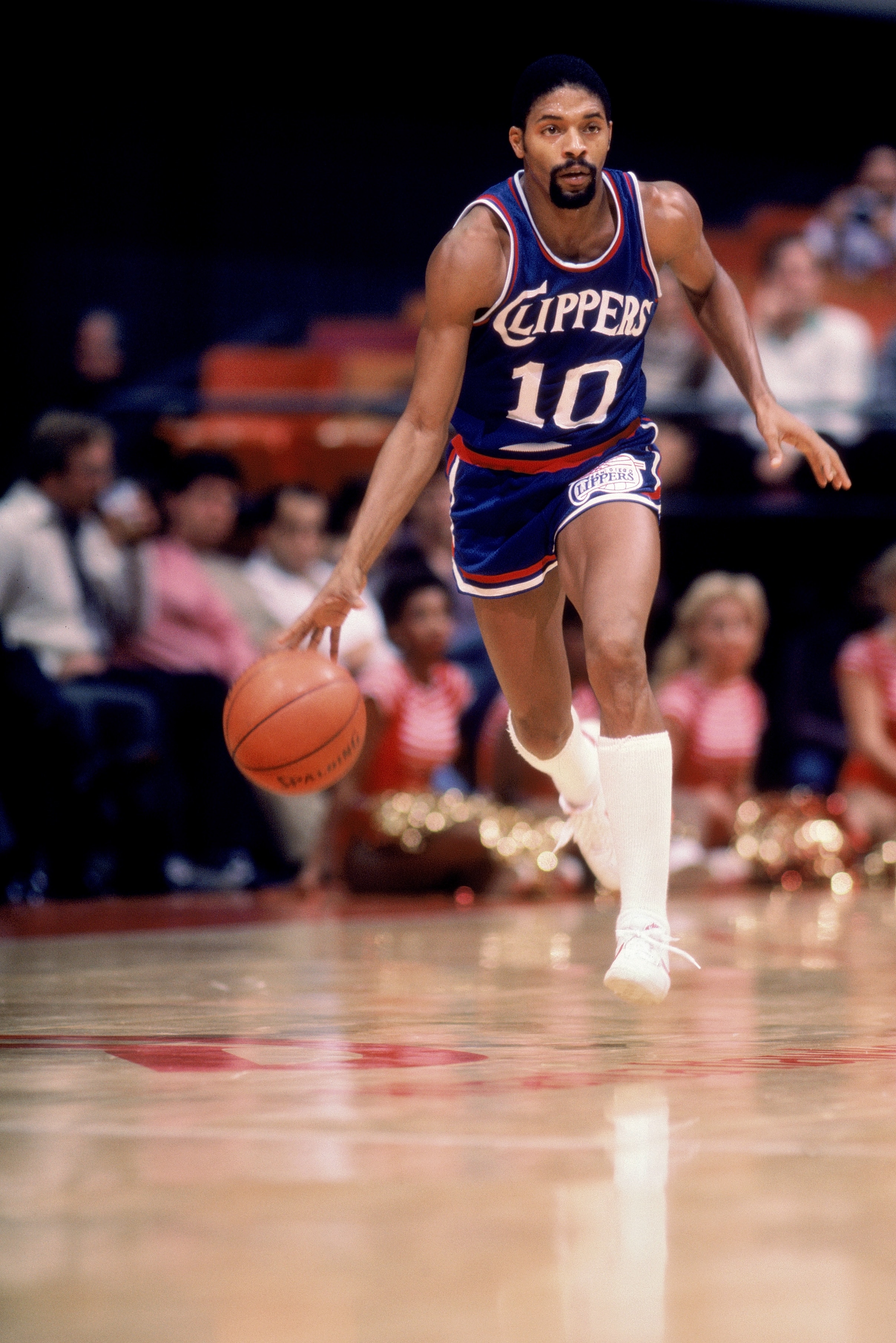 NOVEMBER 1983: Norm Nixon #10 of the San Diego Clippers dribbles down court during a game in November, 1983. (Photo by Scott Cunningham/Getty Images)