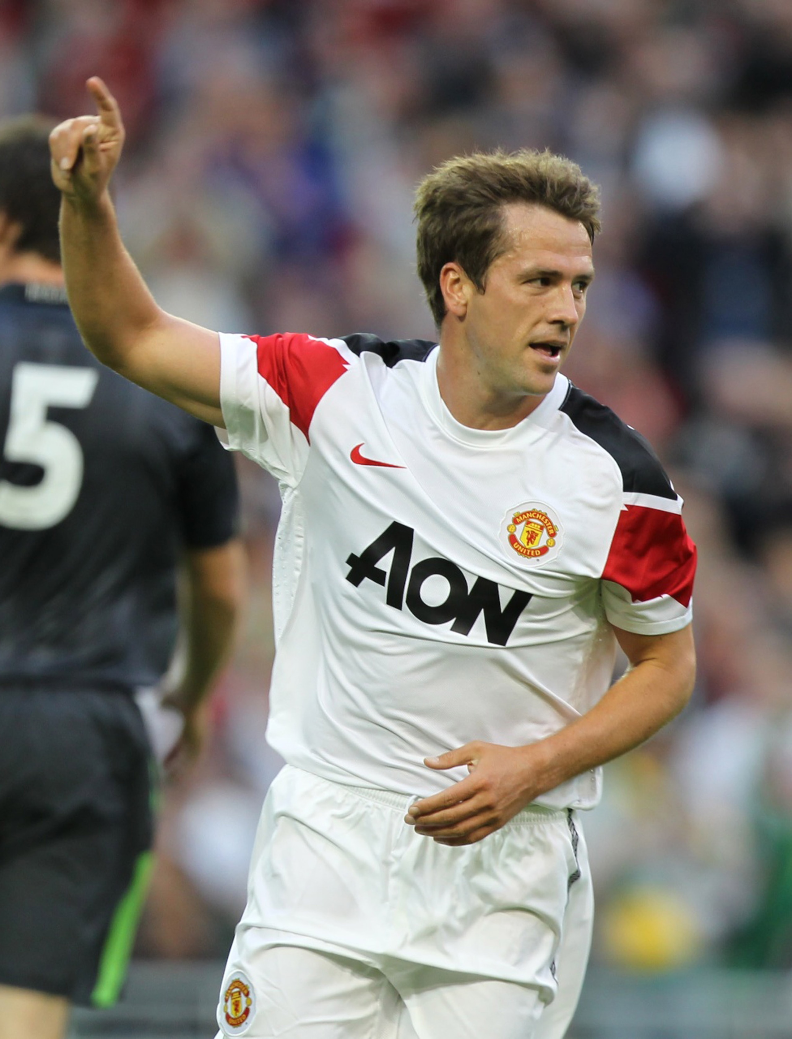DUBLIN,  IRELAND AUGUST 4:  Michael Owen of Manchester United celebrates scoring the second goal during the Airtricity XI v Manchester United XI Friendly Match at the Aviva Stadium on August 4, 2010 in Dublin, Republic of Ireland. (Photo by Patrick Bolger