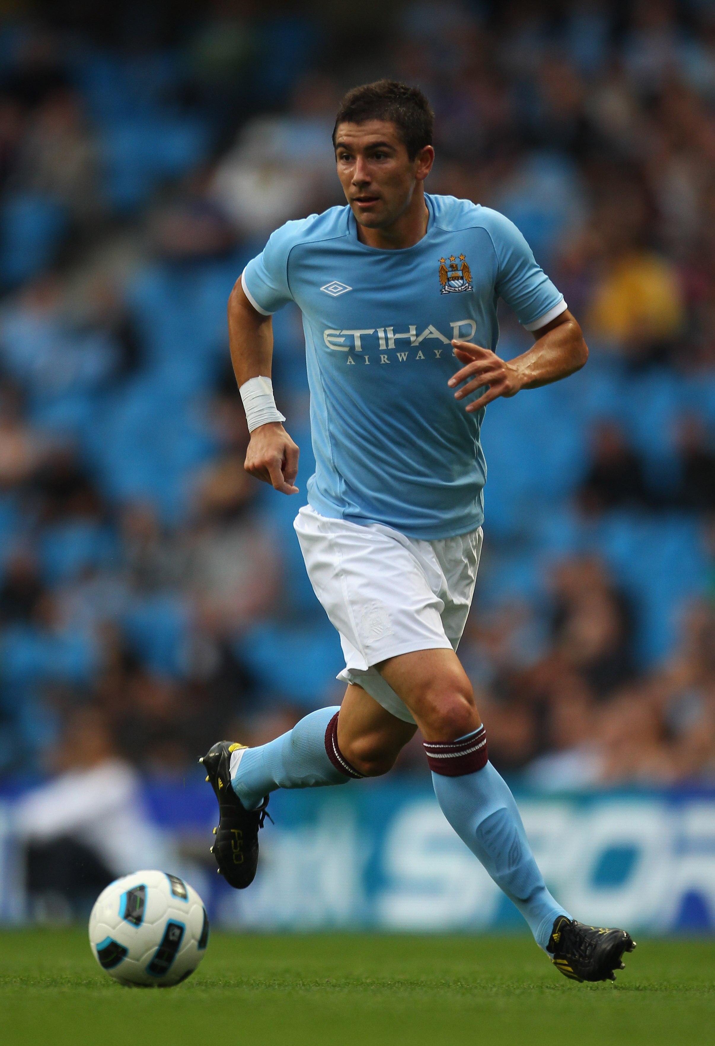 MANCHESTER, ENGLAND - AUGUST 07:  Aleksandar Kolarov of Manchester City during the pre-season friendly match between Manchester City and Valencia at the City of Manchester Stadium on August 7, 2010 in Manchester, England.  (Photo by Alex Livesey/Getty Ima