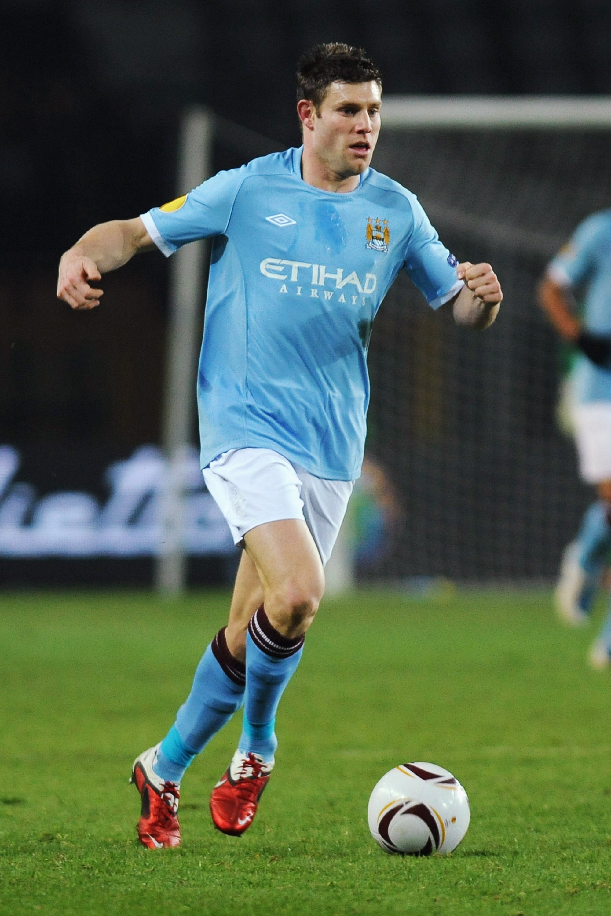 TURIN, ITALY - DECEMBER 16:  James Milner of Manchester City in action during the UEFA Europa League group A match between Juventus FC and Manchester City at Stadio Olimpico di Torino on December 16, 2010 in Turin, Italy.  (Photo by Valerio Pennicino/Gett