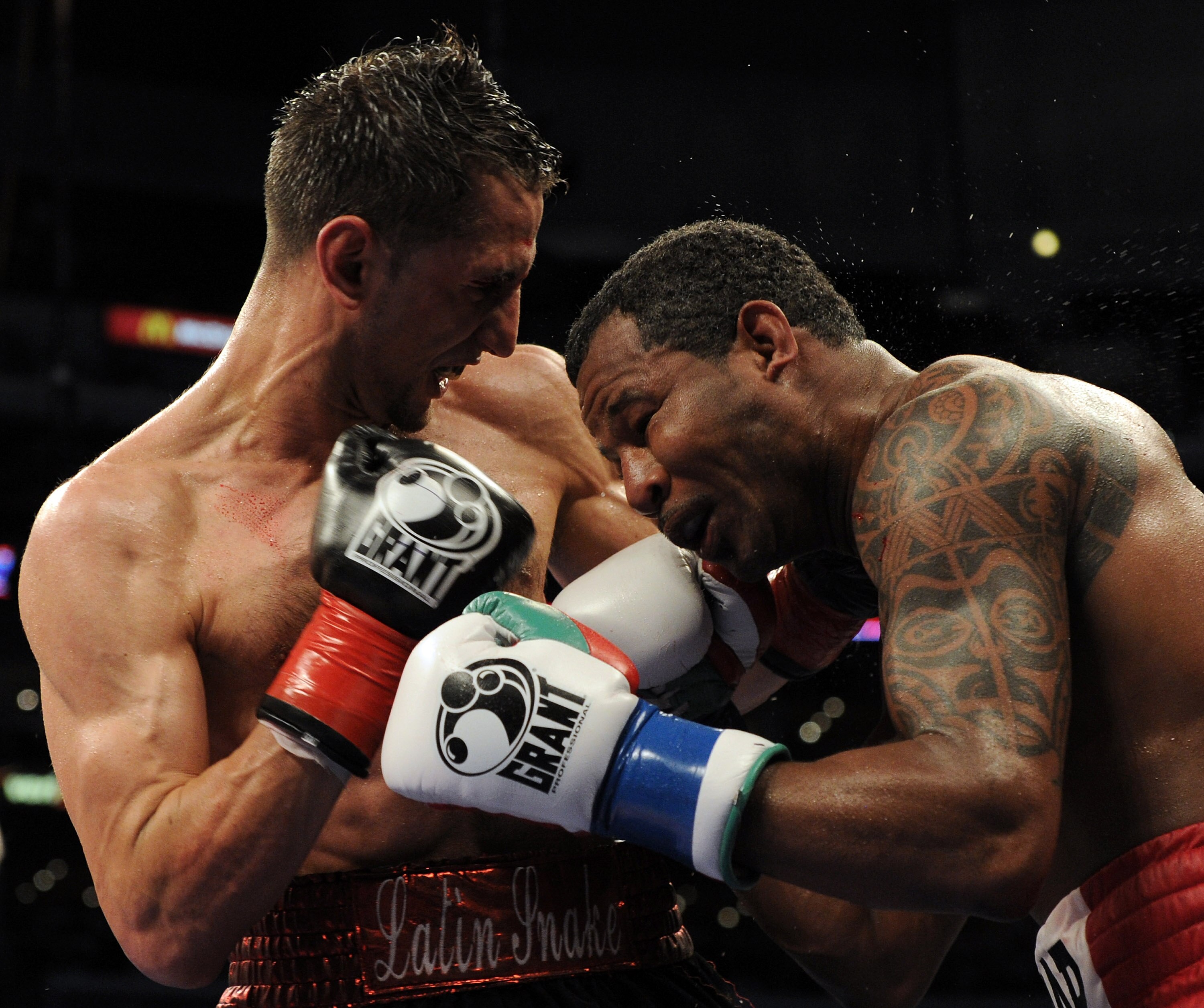 LOS ANGELES, CA - SEPTEMBER 18:  Sergio Mora hits Shane Mosley during the 10th round of the Middleweight bout at Staples Center on September 18, 2010 in Los Angeles, California.  The fight ended in a draw.  (Photo by Harry How/Getty Images)