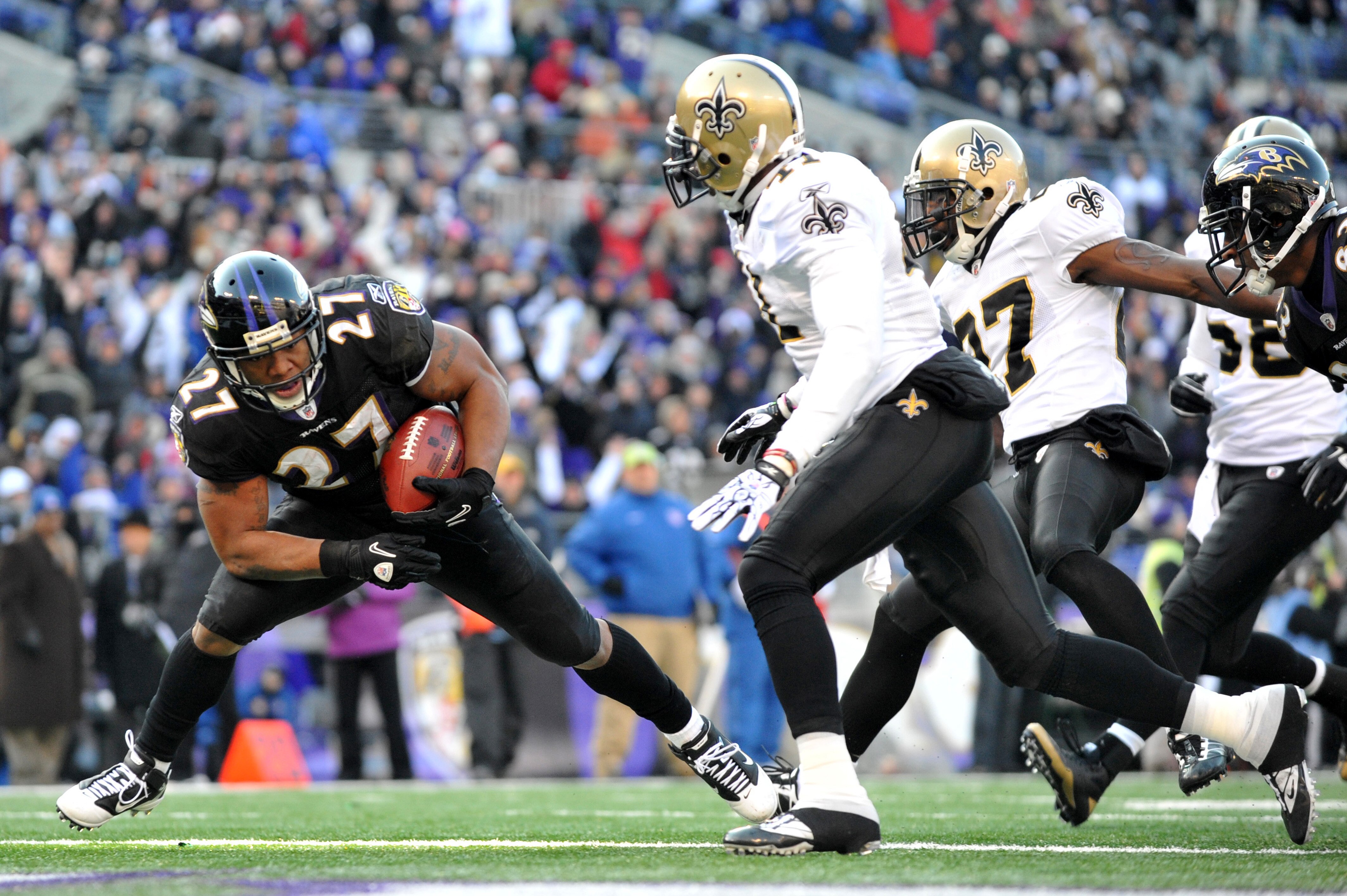 BALTIMORE, MD - DECEMBER 19:  Ray Rice #27 of the Baltimore Ravens score the Ravens second touchdown against the New Orleans Saints  at M&T Bank Stadium on December 19, 2010 in Baltimore, Maryland. The Ravens lead the Saints at the half 21-14. (Photo by L
