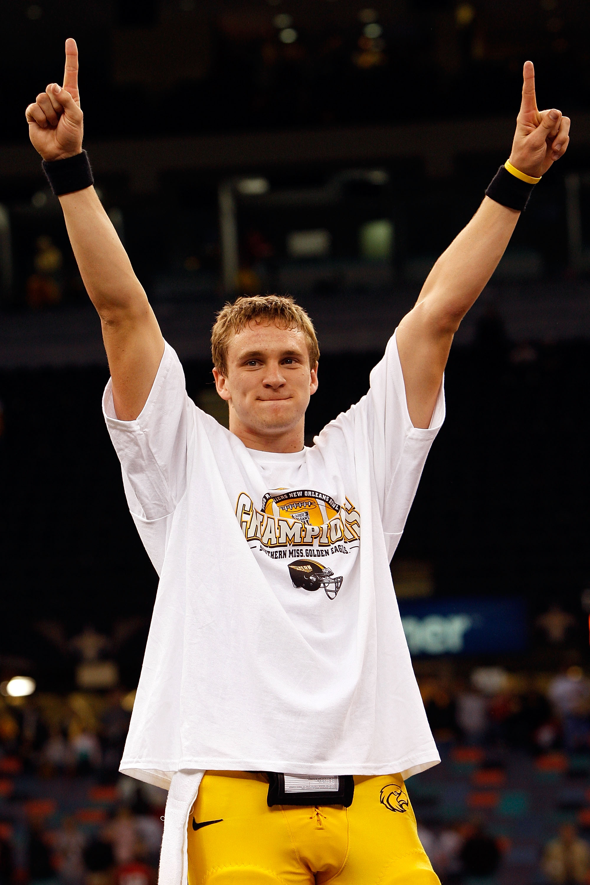 NEW ORLEANS - DECEMBER 21: Austin Davis #12 of the Southern Mississippi Golden Eagles celebrates as he is being named the MVP after defeating the Troy Trojans in the R+L Carriers New Orleans Bowl on December 21, 2008 at the Superdome in New Orleans, Louis
