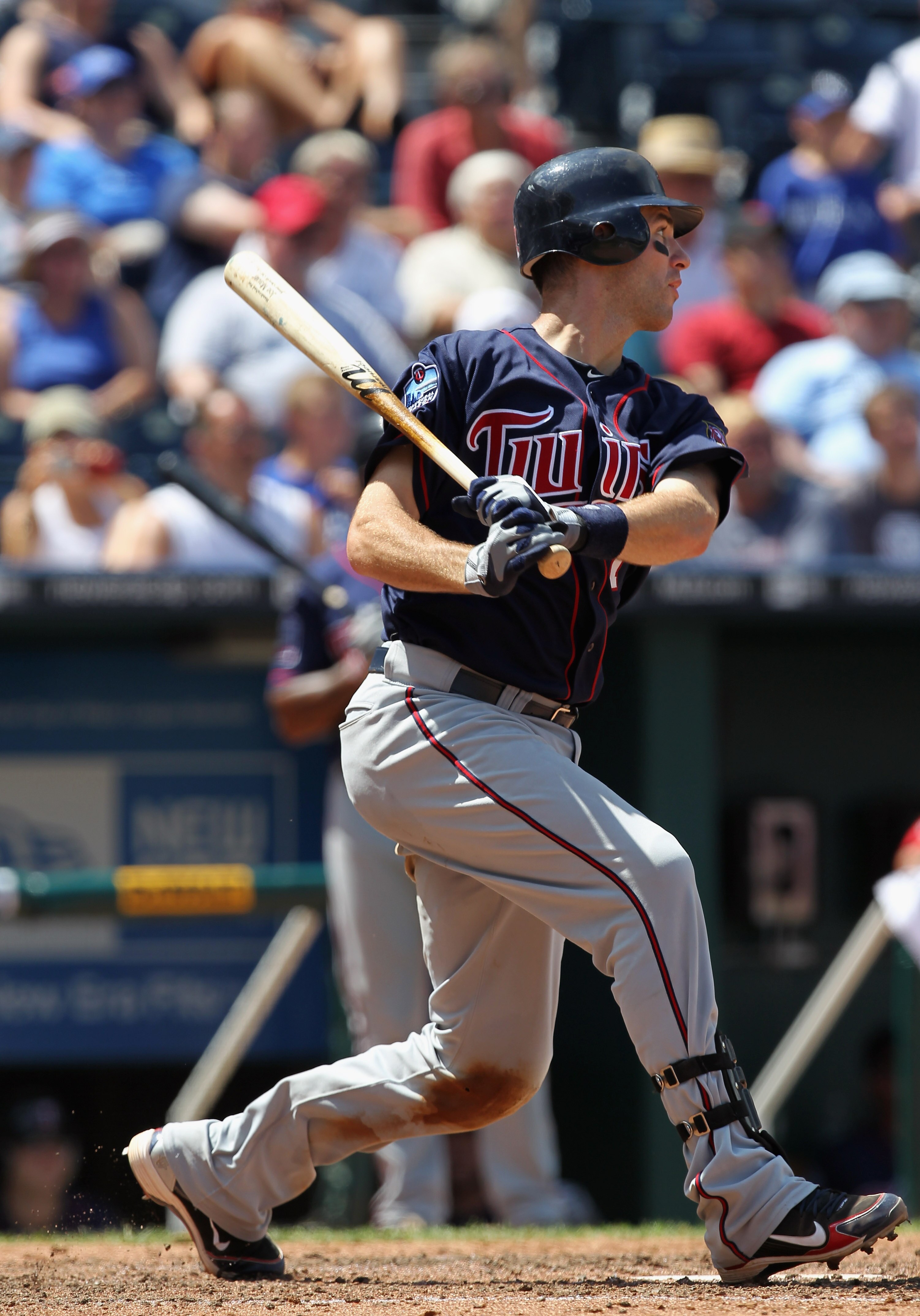 KANSAS CITY, MO - JULY 28:  Catcher Joe Mauer #7 of the Minnesota Twins bats during the game against the Kansas City Royals on July 28, 2010 at Kauffman Stadium in Kansas City, Missouri.  (Photo by Jamie Squire/Getty Images)