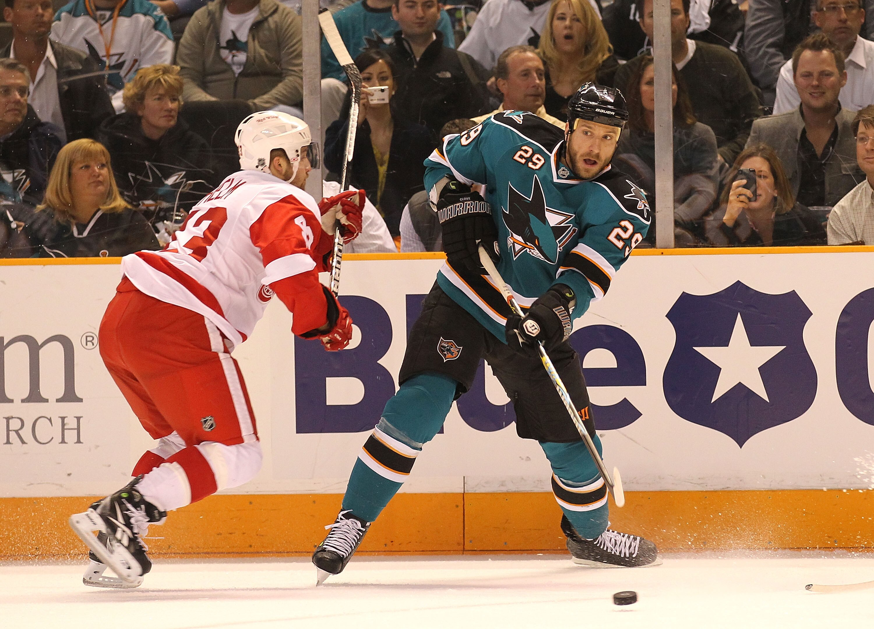 SAN JOSE, CA - MAY 8: Ryan Clowe #29 of the San Jose Sharks skates with the puck against Johan Franzen #93 of the Detroit Red Wings in Game Five of the Western Conference Semifinals during the 2010 NHL Stanley Cup Playoffs at HP Pavilion on May 8, 2010 in