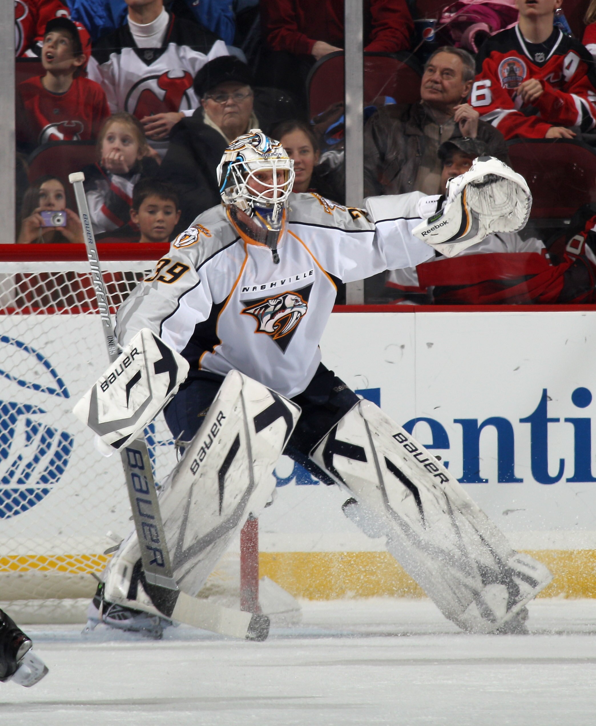 NEWARK, NJ - DECEMBER 17: Anders Lindback #39 of the Nashville Predators skates against the New Jersey Devils at the Prudential Center on December 17, 2010 in Newark, New Jersey.  (Photo by Bruce Bennett/Getty Images)