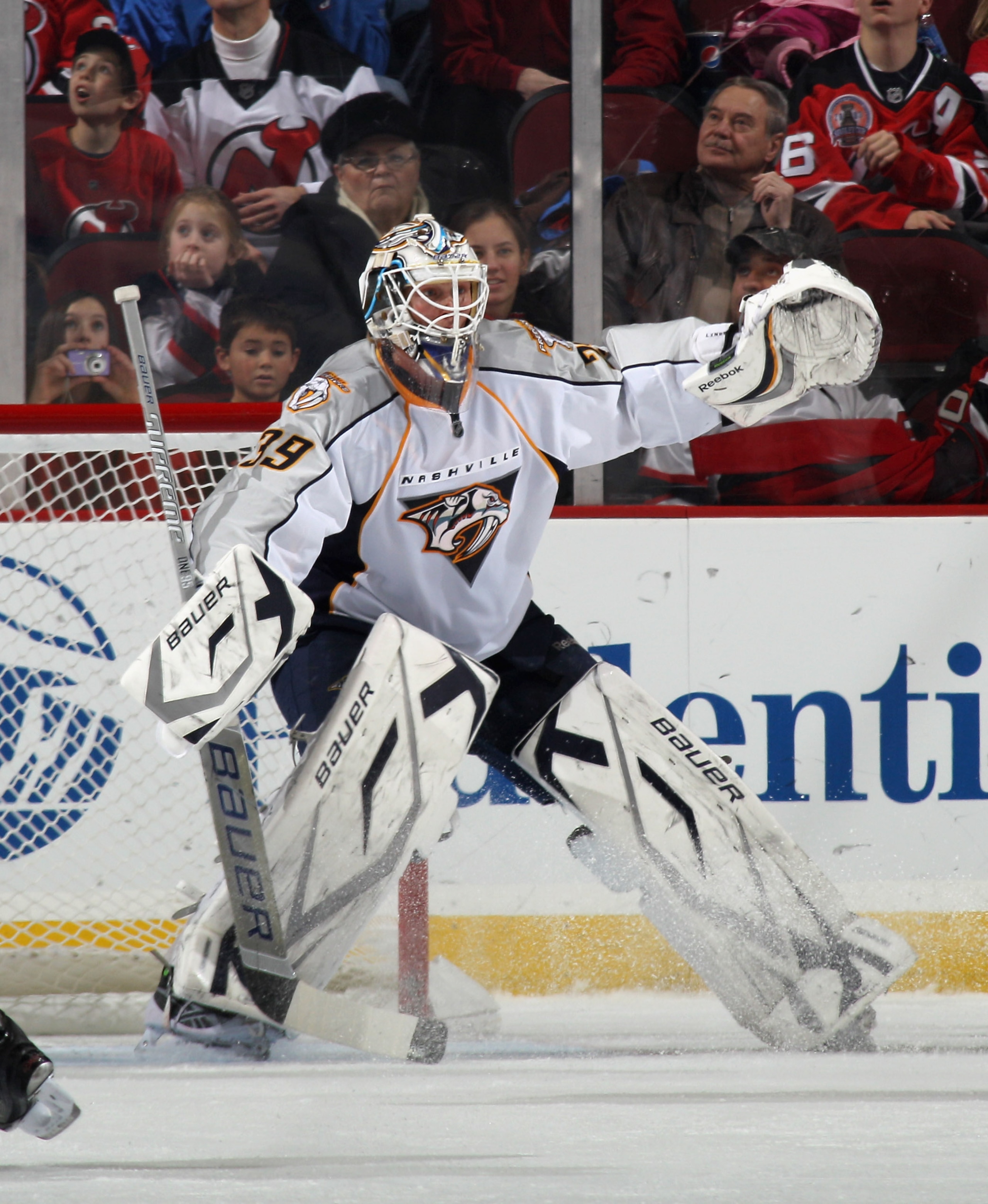 NEWARK, NJ - DECEMBER 17: Anders Lindback #39 of the Nashville Predators skates against the New Jersey Devils at the Prudential Center on December 17, 2010 in Newark, New Jersey.  (Photo by Bruce Bennett/Getty Images)
