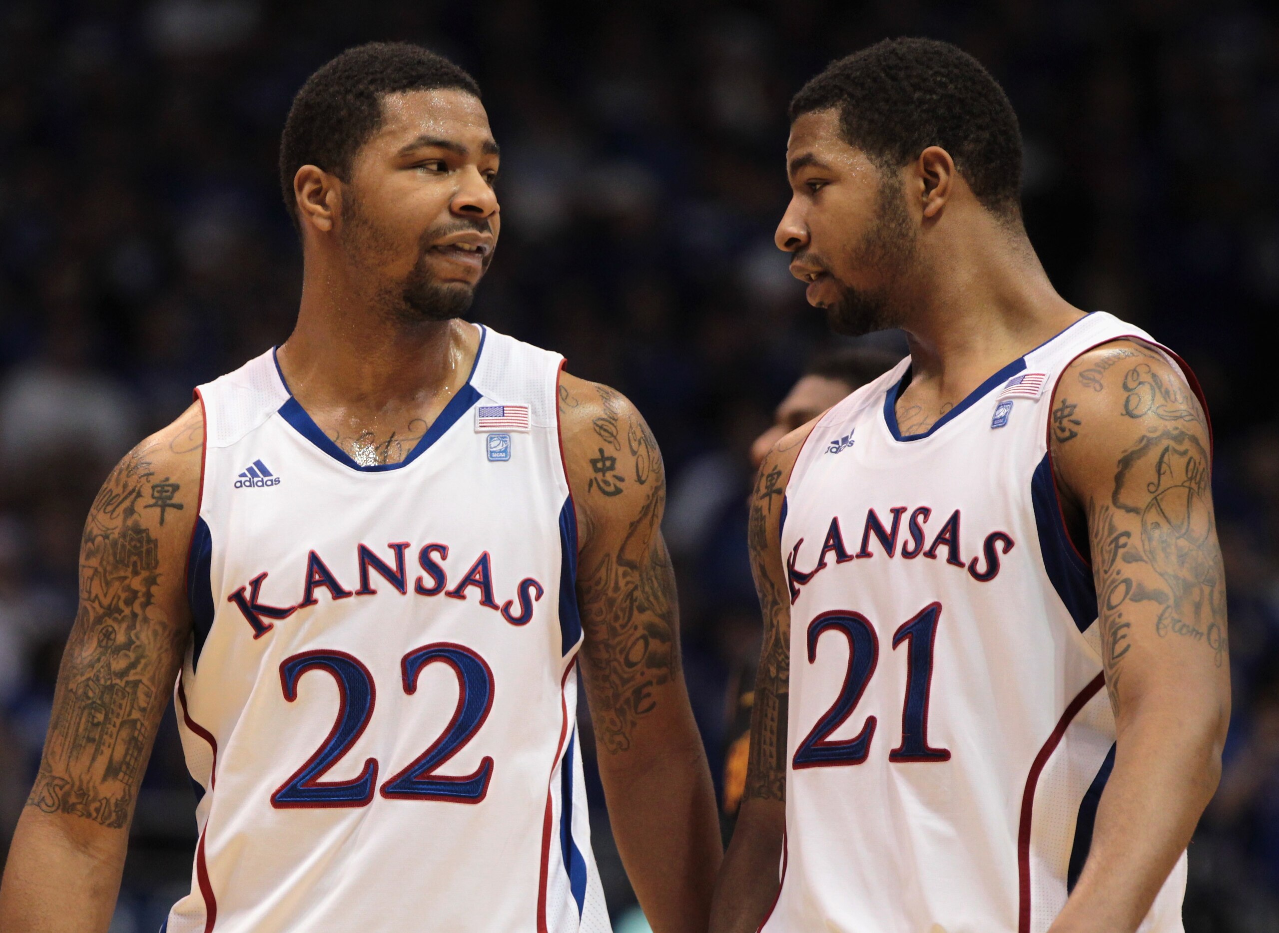 LAWRENCE, KS - DECEMBER 18: Marcus Morris #22 and Markieff Morris #21 of the Kansas Jayhawks talk during the game against the USC Trojans on December 18, 2010 at Allen Fieldhouse in Lawrence, Kansas. (Photo by Jamie Squire/Getty Images) LAWRENCE, KS - DECEMBER 18: Marcus Morris #22 and Markieff Morris #21 of the Kansas Jayhawks talk during the game against the USC Trojans on December 18, 2010 at Allen Fieldhouse in Lawrence, Kansas. (Photo by Jamie Squire/Getty Images)