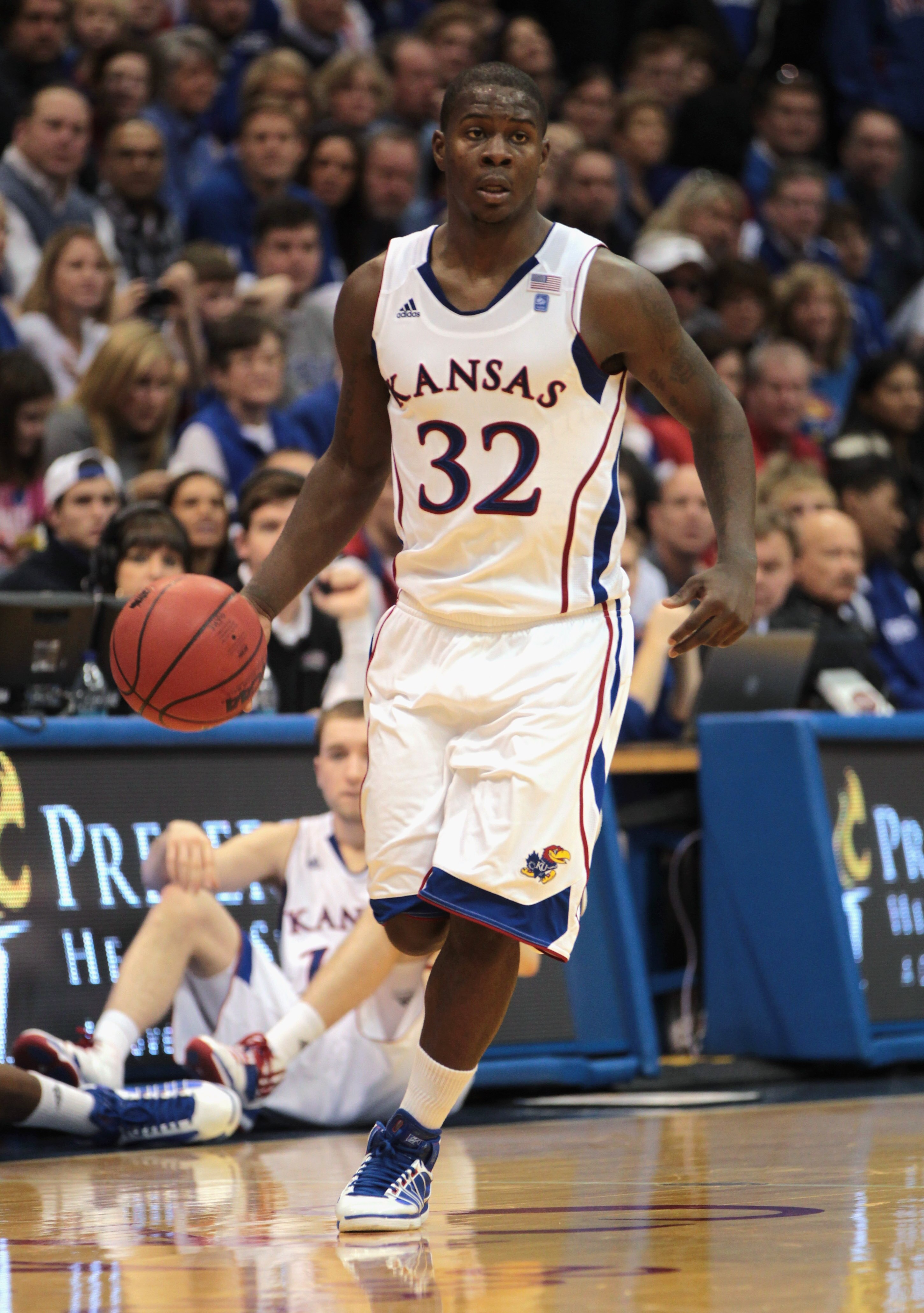 LAWRENCE, KS - DECEMBER 18:  Josh Selby #32 of the Kansas Jayhawks in action during the game against the USC Trojans on December 18, 2010 at Allen Fieldhouse in Lawrence, Kansas.  (Photo by Jamie Squire/Getty Images)