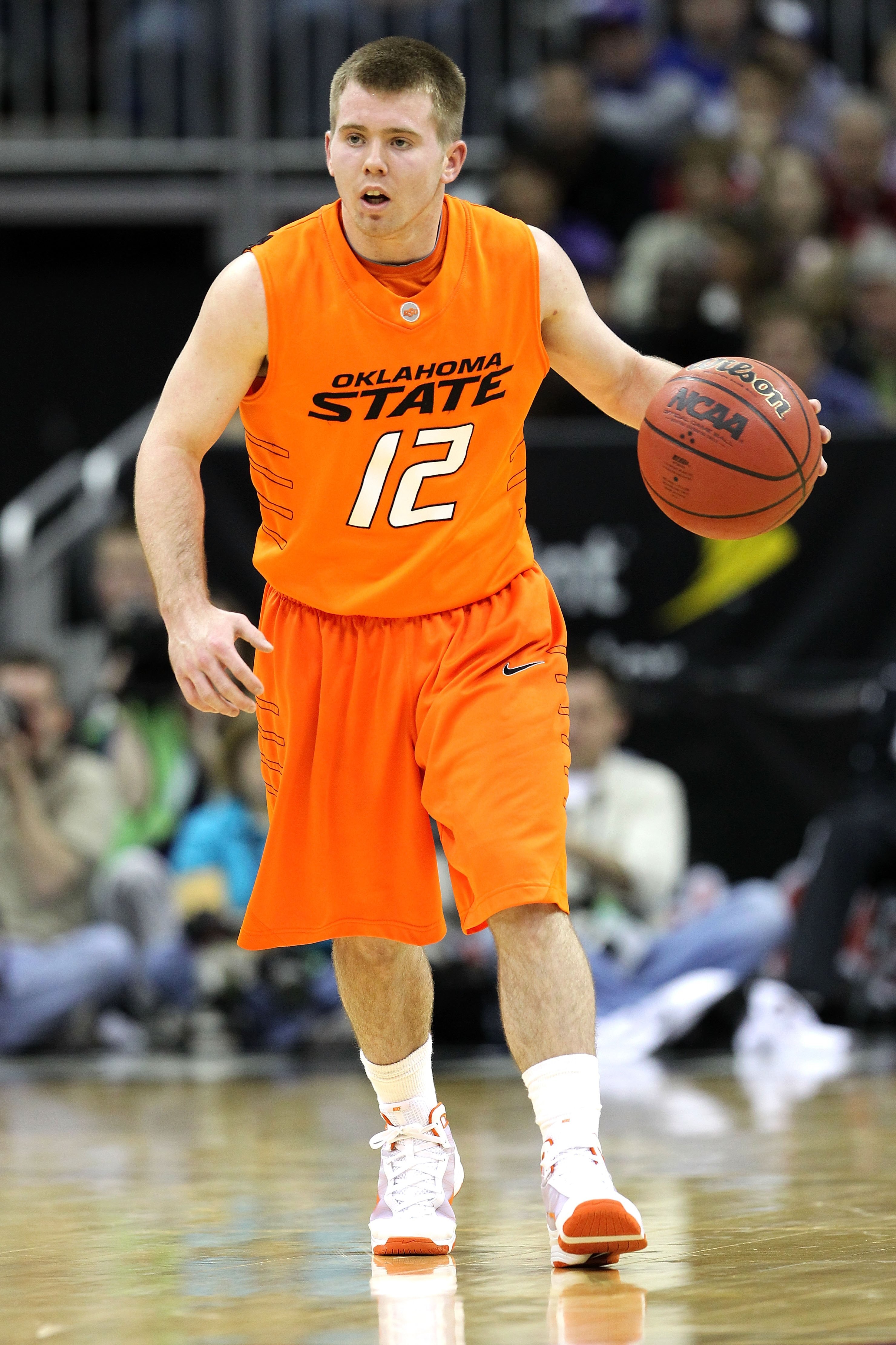 KANSAS CITY, MO - MARCH 11:  Keiton Page #12 of the Oklahoma State Cowboys moves the ball while taking on the Kansas State Wildcats during the quarterfinals of the 2010 Phillips 66 Big 12 Men's Basketball Tournament at the Sprint Center on March 11, 2010