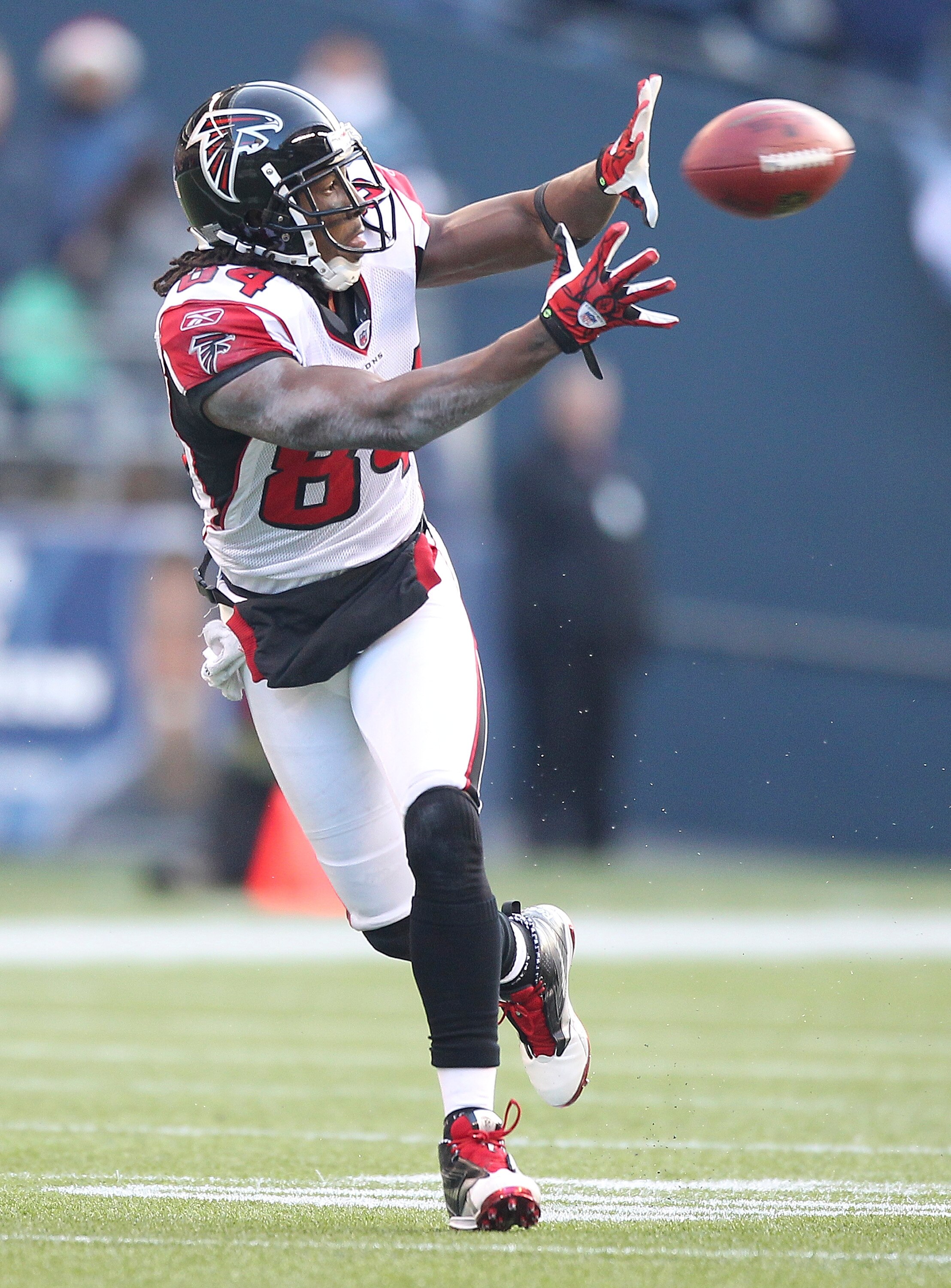 SEATTLE, WA - DECEMBER 19: Wide receiver Roddy White #84 of the Atlanta Falcons makes a catch for a first down in the second quarter against the Seattle Seahawks at Qwest Field on December 19, 2010 in Seattle, Washington. (Photo by Otto Greule Jr/Getty I SEATTLE, WA - DECEMBER 19: Wide receiver Roddy White #84 of the Atlanta Falcons makes a catch for a first down in the second quarter against the Seattle Seahawks at Qwest Field on December 19, 2010 in Seattle, Washington. (Photo by Otto Greule Jr/Getty I