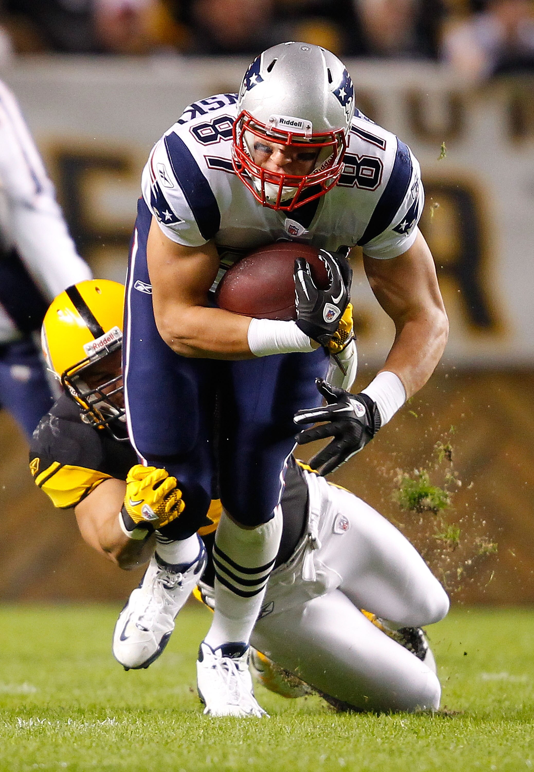 PITTSBURGH, PA - NOVEMBER 14: Rob Gronkowski #87 of the New England Patriots is tackled after a completed pass by James Farrior #51 of the Pittsburgh Steelers during the game on November 14, 2010 at Heinz Field in Pittsburgh, Pennsylvania. (Photo by Jar PITTSBURGH, PA - NOVEMBER 14: Rob Gronkowski #87 of the New England Patriots is tackled after a completed pass by James Farrior #51 of the Pittsburgh Steelers during the game on November 14, 2010 at Heinz Field in Pittsburgh, Pennsylvania. (Photo by Jar