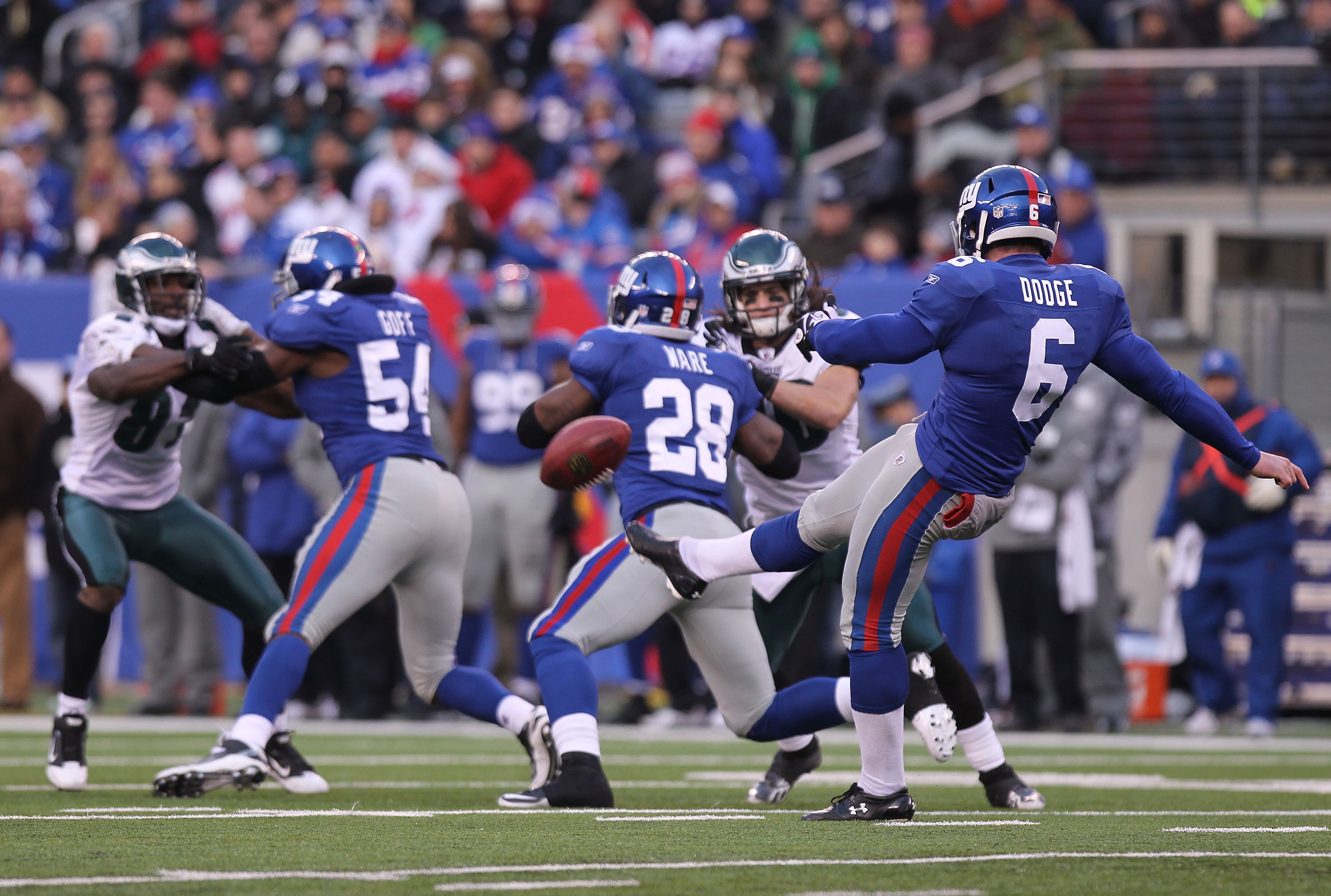 EAST RUTHERFORD, NJ - DECEMBER 19:  Matt Dodge #6 of the New York Giants punts against the Philadelphia Eagles at New Meadowlands Stadium on December 19, 2010 in East Rutherford, New Jersey.  (Photo by Nick Laham/Getty Images)