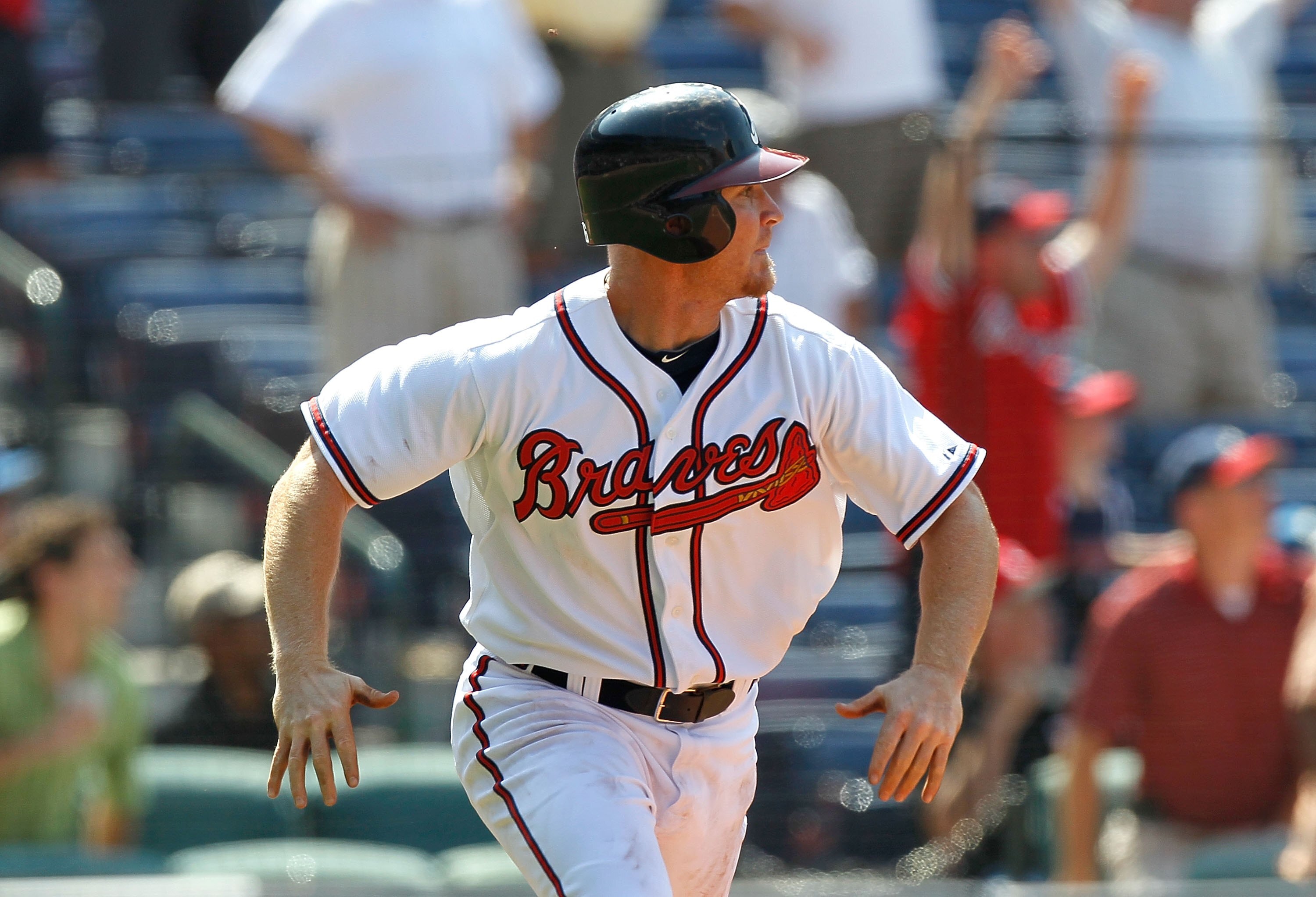 ATLANTA - MAY 20:  Pinch hitter Brooks Conrad #26 of the Atlanta Braves hits a walk-off grand slam to give the Braves a 10-9 win over over the Cincinnati Reds at Turner Field on May 20, 2010 in Atlanta, Georgia.  (Photo by Kevin C. Cox/Getty Images)